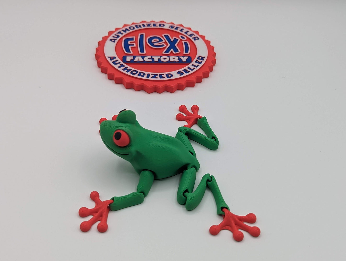 Frog 3D Printed Tree Frog Articulated Toy by Flexi Factory that will leap into your heart and spark your imagination.