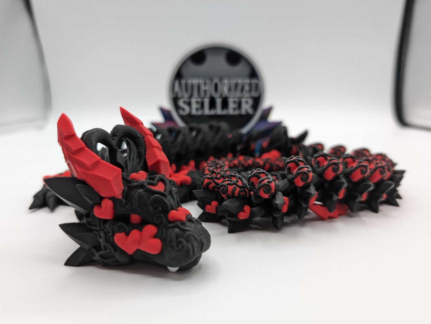 Discover the magic of our Valentine Heart Dragon! This enchanting articulating dragon not only graces your bookshelf with whimsy but also makes for a heartfelt and unforgettable Valentine's Day gift. Elevate your space with love!