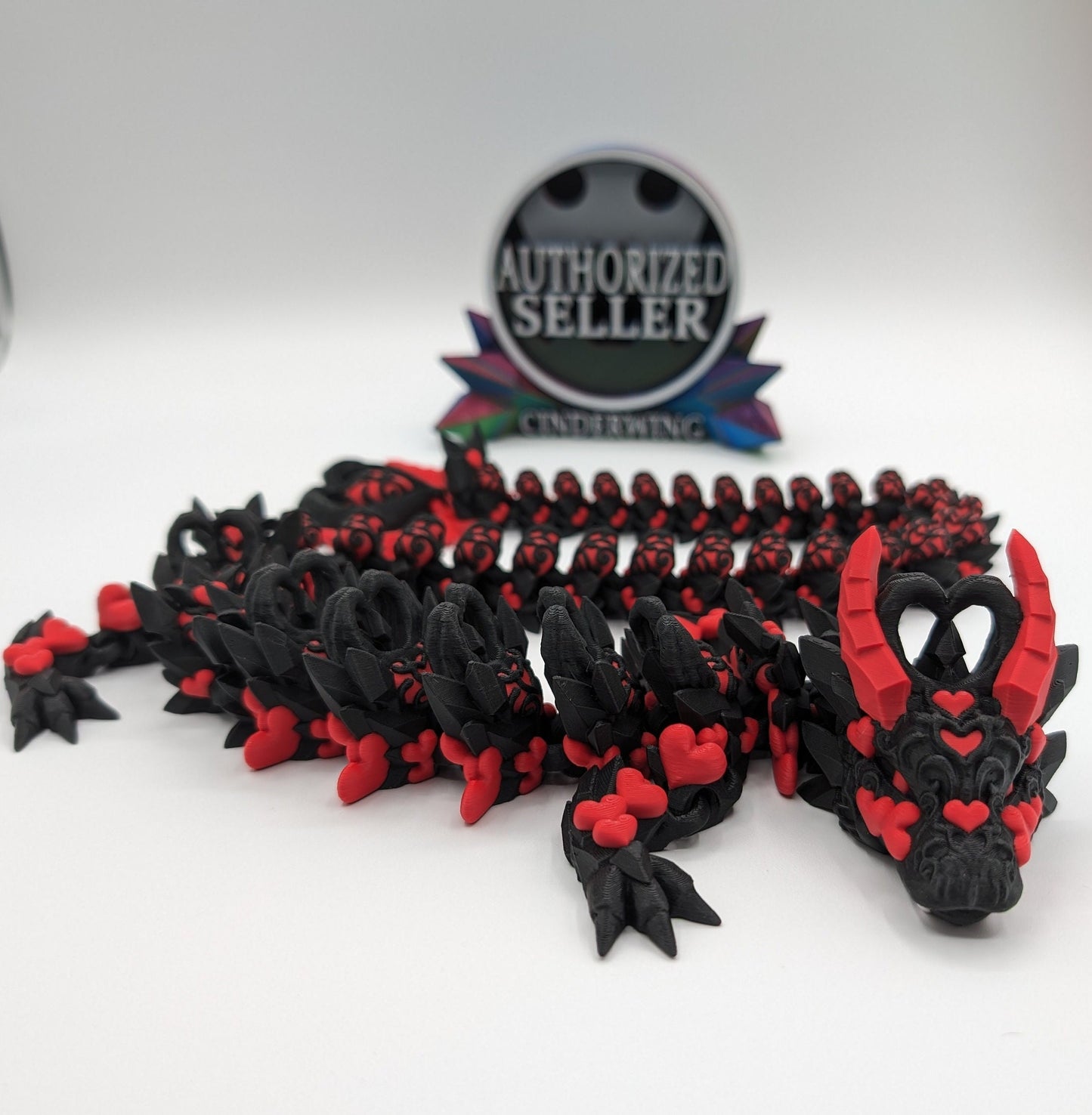 Discover the magic of our Valentine Heart Dragon! This enchanting articulating dragon not only graces your bookshelf with whimsy but also makes for a heartfelt and unforgettable Valentine's Day gift. Elevate your space with love!