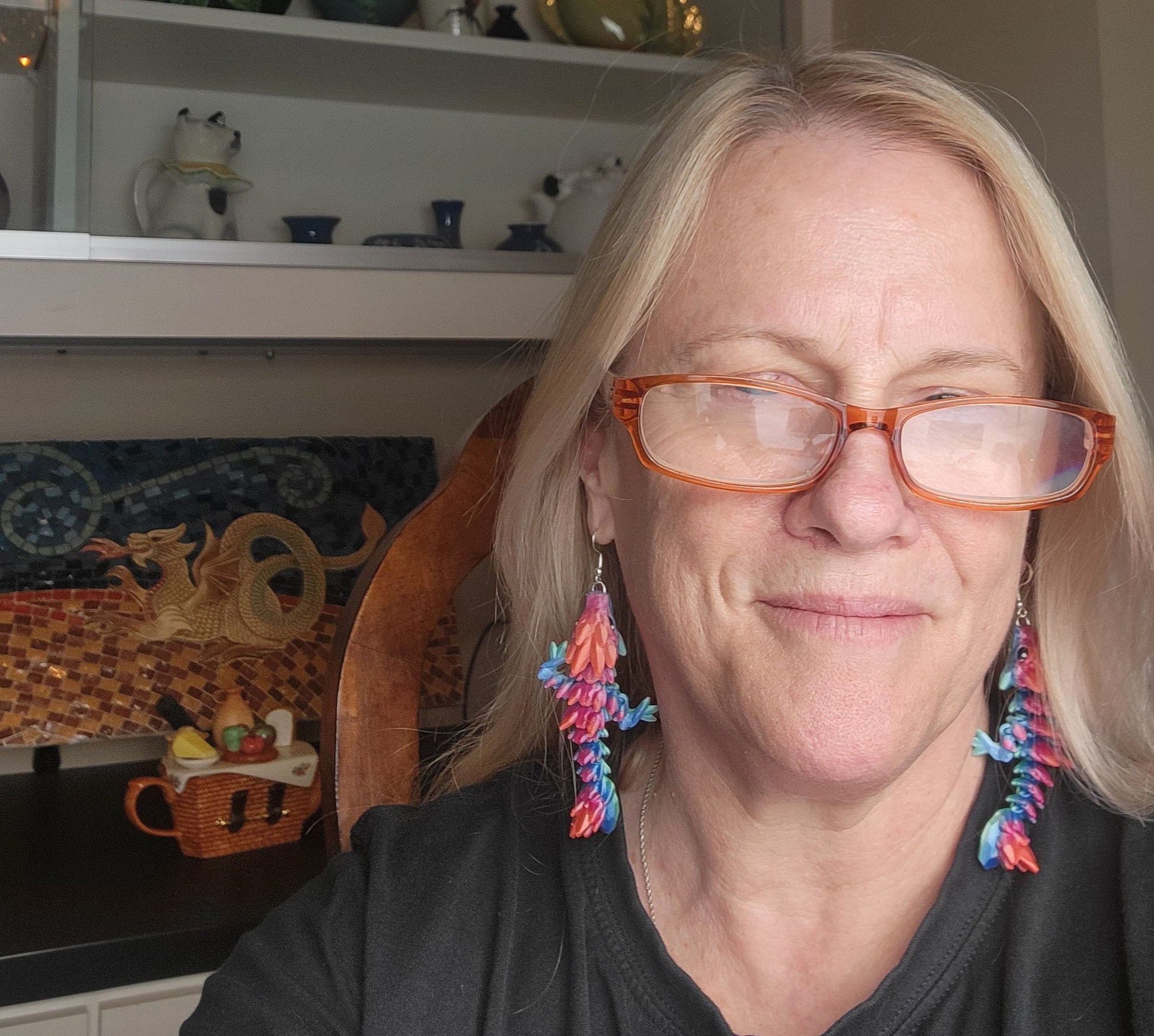 Handcrafted with exquisite detail, these enchanting earrings are the perfect blend of fantasy and elegance, designed to add a touch of whimsy to any outfit. The baby dragon is articulated and moveable.