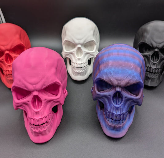 Introducing our Articulated Halloween Vampire Human Skull, the perfect addition to your Halloween decor or gothic collection. This intricately designed skull is a fun and interactive item, thanks to its fully articulated jaw. Multiple colors offered!
