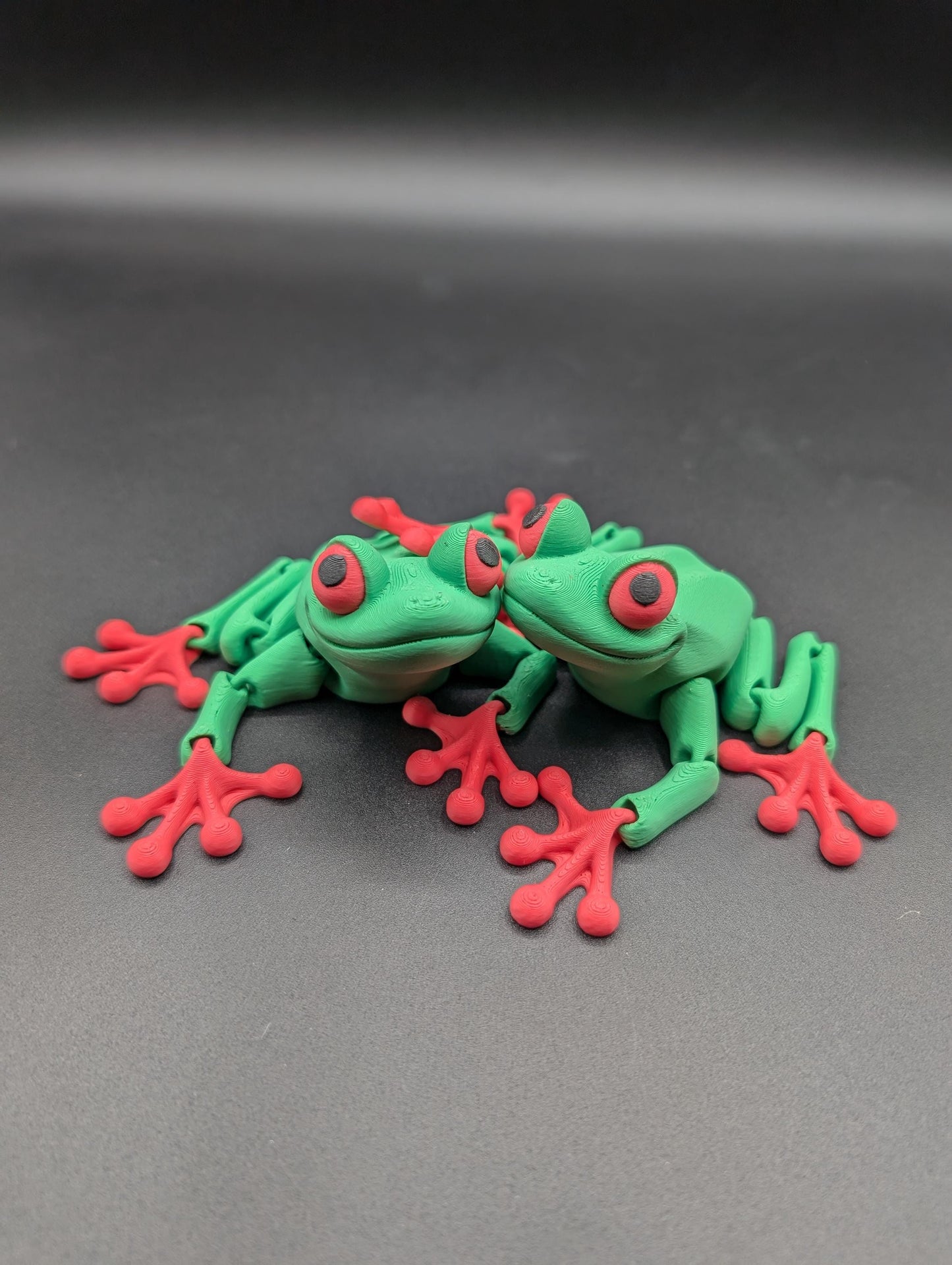 Frog 3D Printed Tree Frog Articulated Toy by Flexi Factory that will leap into your heart and spark your imagination.