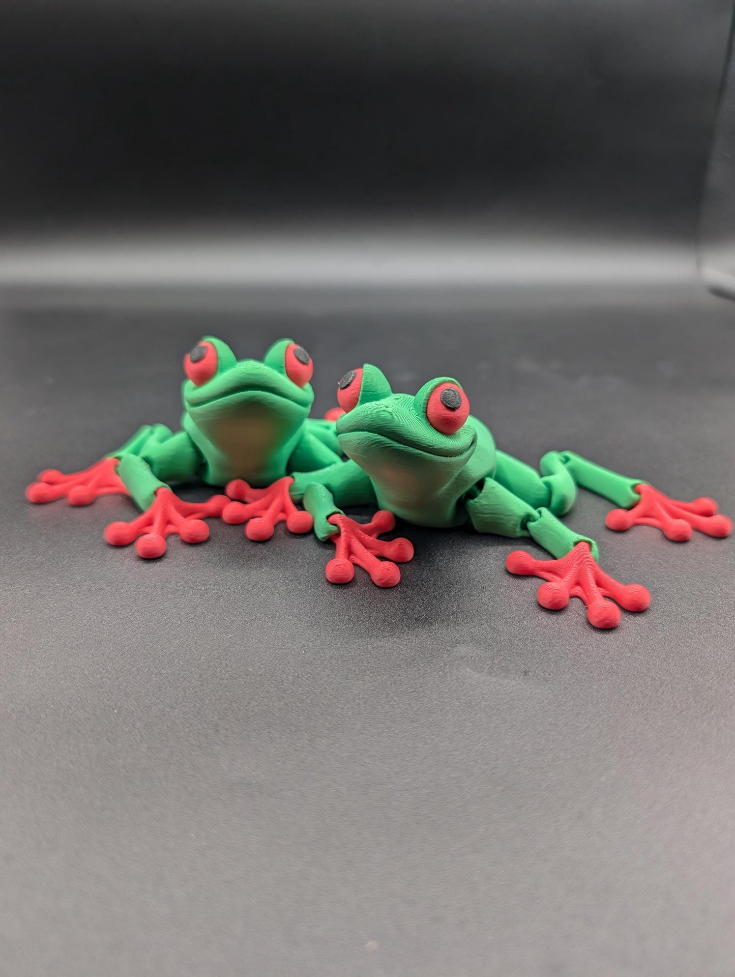 Frog 3D Printed Tree Frog Articulated Toy by Flexi Factory that will leap into your heart and spark your imagination.