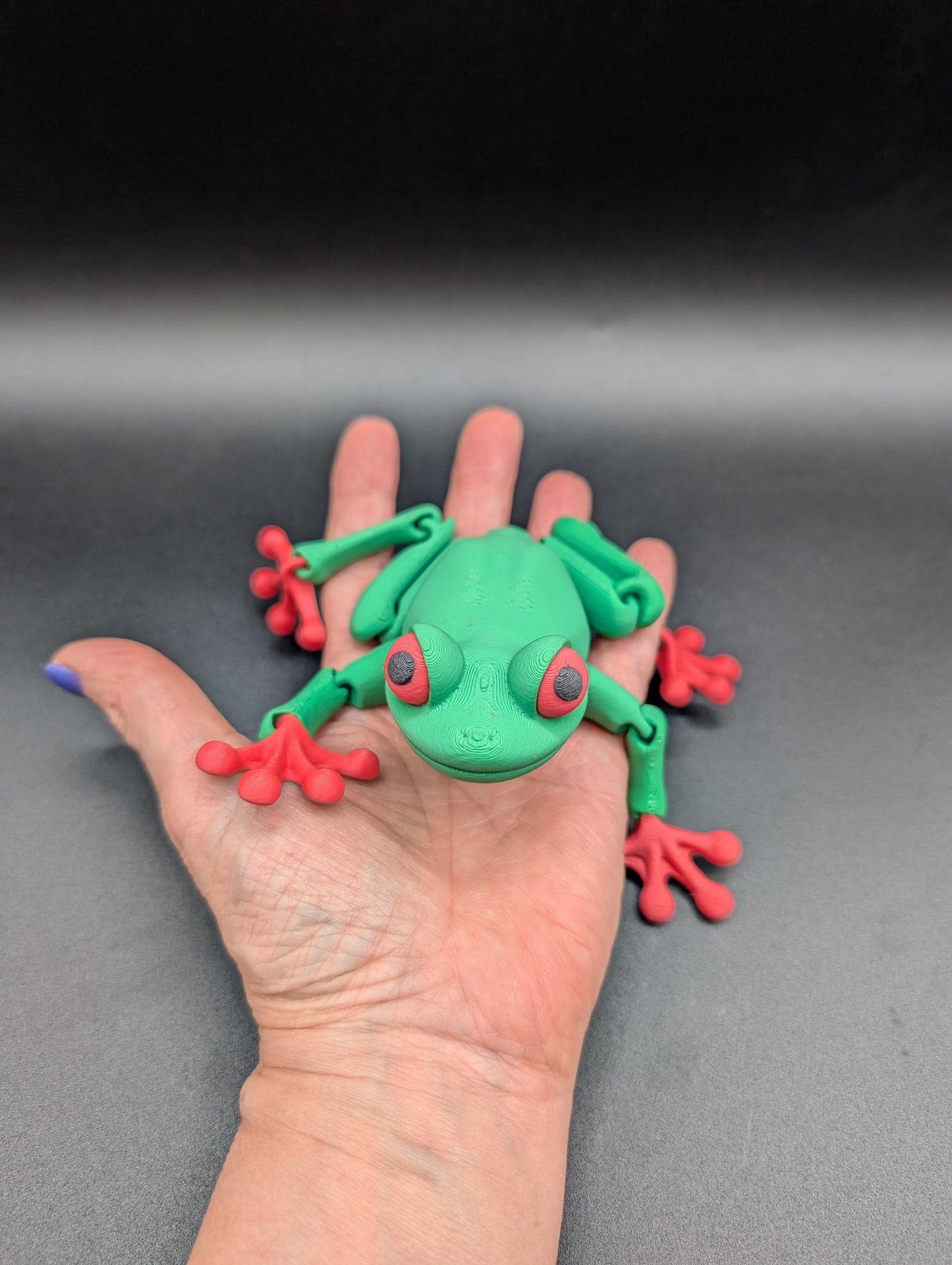 Frog 3D Printed Tree Frog Articulated Toy by Flexi Factory that will leap into your heart and spark your imagination.