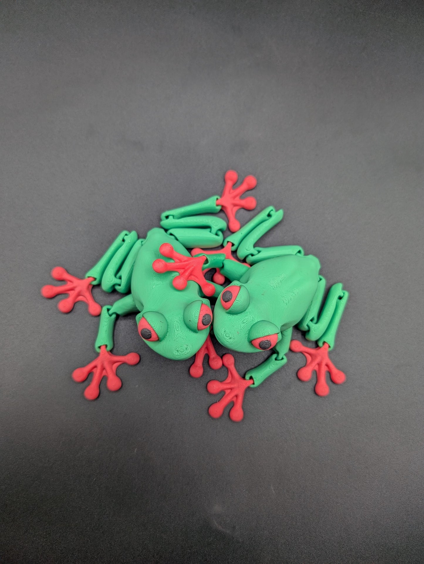 Frog 3D Printed Tree Frog Articulated Toy by Flexi Factory that will leap into your heart and spark your imagination.