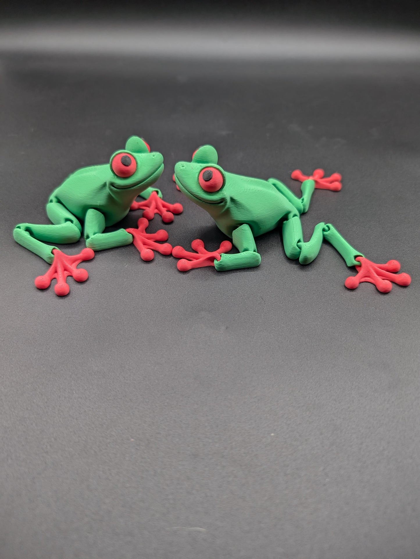 Frog 3D Printed Tree Frog Articulated Toy by Flexi Factory that will leap into your heart and spark your imagination.