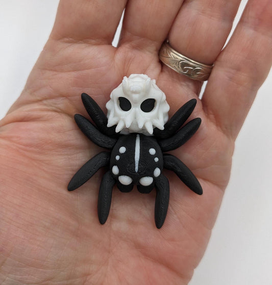Introducing our Spooky Halloween Skull Spider Fidget Toy, a unique blend of eerie charm and stress relief. Perfect for Halloween enthusiasts and fidget fans, this spider toy offers a fun way to unwind and celebrate the season.
