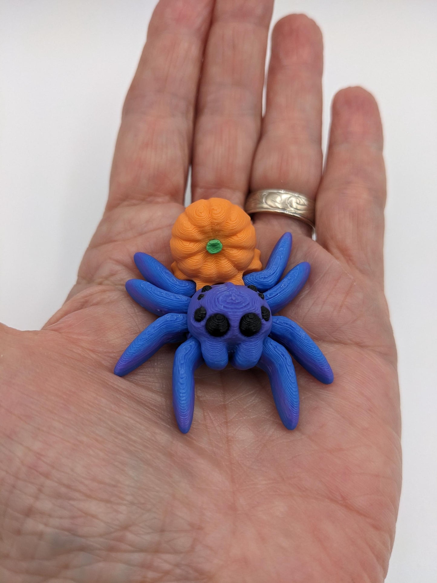 Introducing our Articulated Halloween Pumpkin Spider Fidget Toy, a delightful combination of spooky  fun and stress relief. Perfect for Halloween lovers and fidget enthusiasts, this spider toy offers a unique way to unwind and celebrate the season.