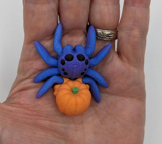 Introducing our Articulated Halloween Pumpkin Spider Fidget Toy, a delightful combination of spooky  fun and stress relief. Perfect for Halloween lovers and fidget enthusiasts, this spider toy offers a unique way to unwind and celebrate the season.