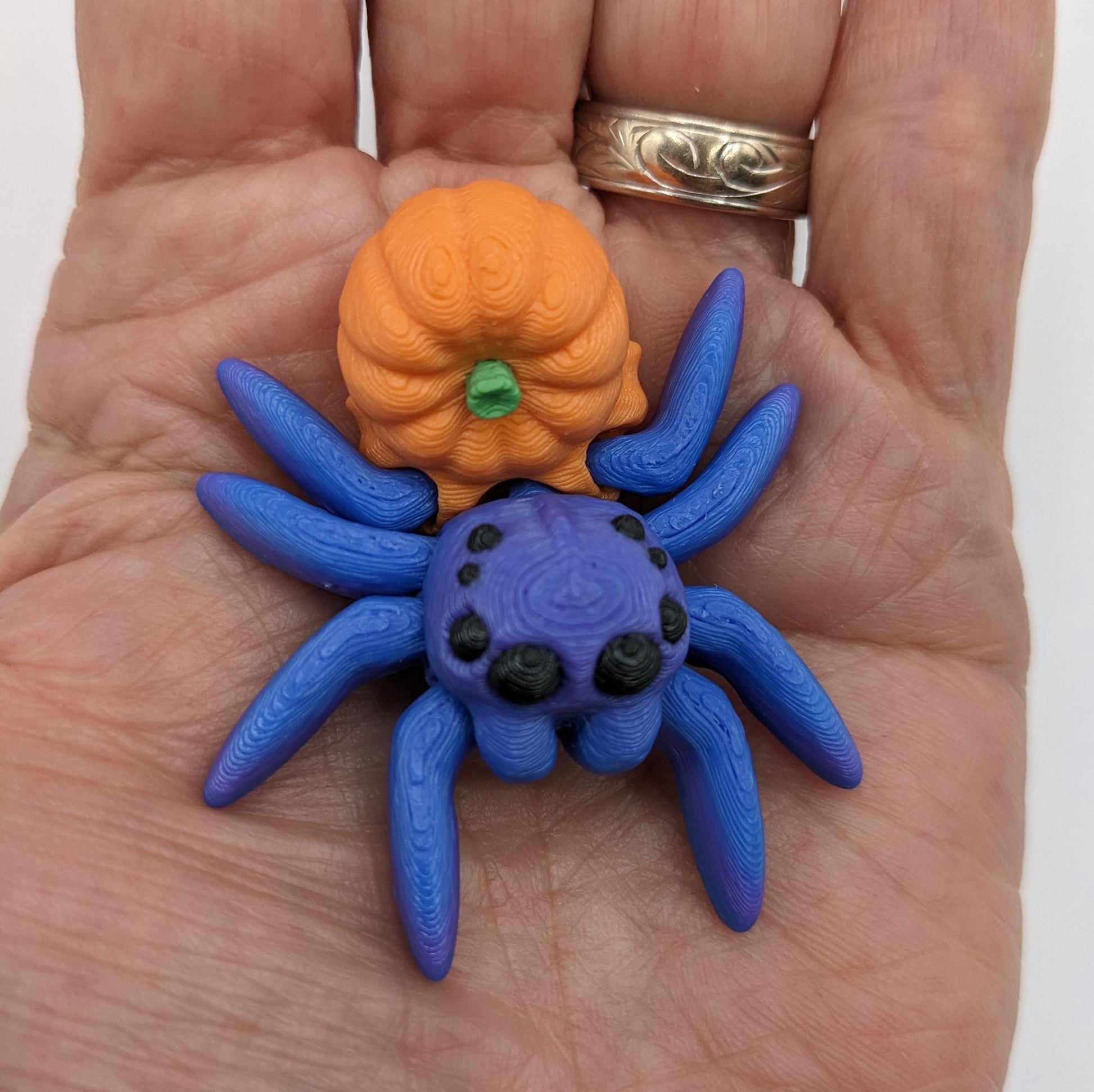 Introducing our Articulated Halloween Pumpkin Spider Fidget Toy, a delightful combination of spooky  fun and stress relief. Perfect for Halloween lovers and fidget enthusiasts, this spider toy offers a unique way to unwind and celebrate the season.