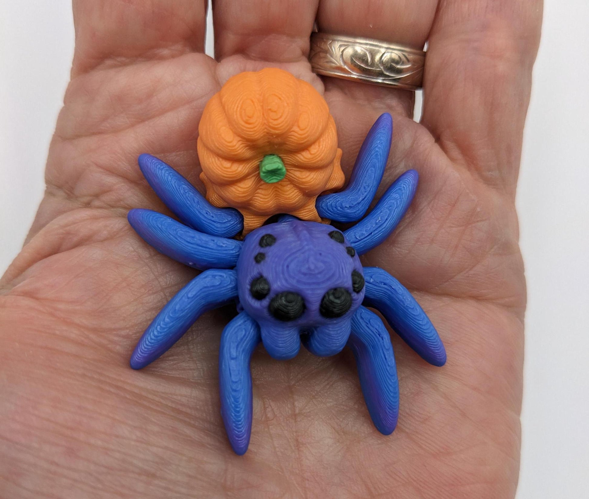 Introducing our Articulated Halloween Pumpkin Spider Fidget Toy, a delightful combination of spooky  fun and stress relief. Perfect for Halloween lovers and fidget enthusiasts, this spider toy offers a unique way to unwind and celebrate the season.