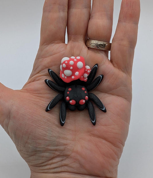 Introducing our Cute Articulated Mushroom Spider, a delightful fusion of nature and imagination. Perfect for anyone who loves unique decor, this charming spider is sure to bring a smile to your face.