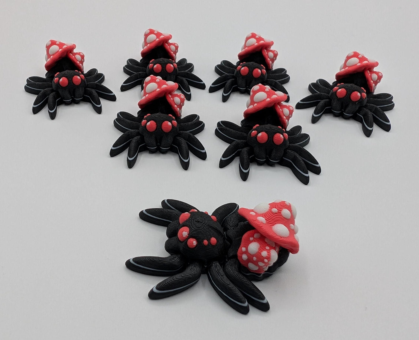 Introducing our Cute Articulated Mushroom Spider, a delightful fusion of nature and imagination. Perfect for anyone who loves unique decor, this charming spider is sure to bring a smile to your face.