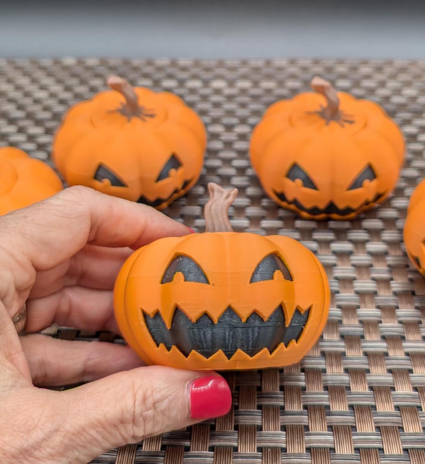 Introducing our Spooky Halloween Pumpkin Toy, a delightful blend of mischief & spooky fun. Perfect for Halloween enthusiasts & collectors, this pumpkin toy adds a playful touch to your seasonal decor. Top comes off to hide small items, even a spider!