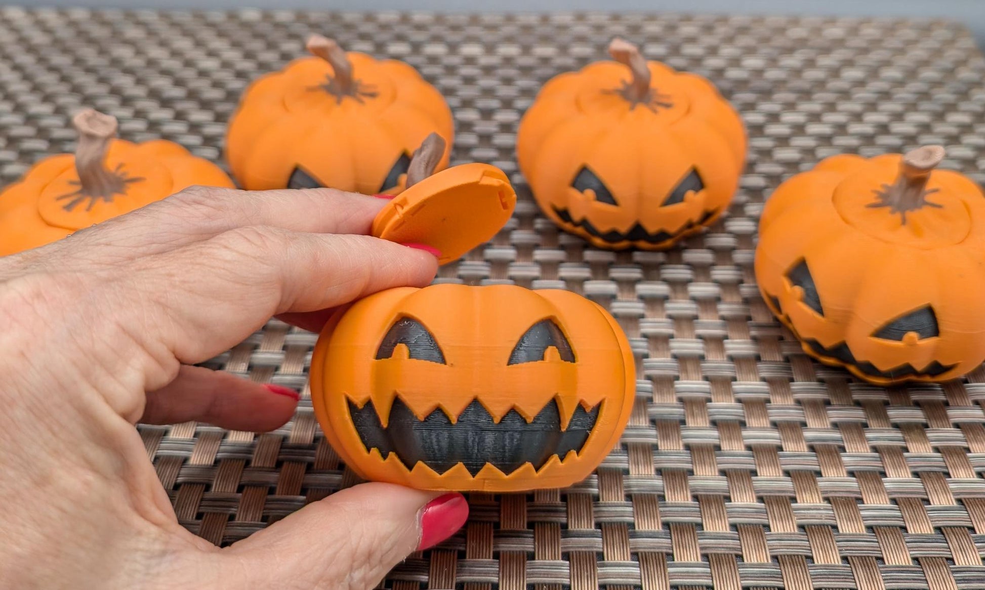 Introducing our Spooky Halloween Pumpkin Toy, a delightful blend of mischief & spooky fun. Perfect for Halloween enthusiasts & collectors, this pumpkin toy adds a playful touch to your seasonal decor. Top comes off to hide small items, even a spider!