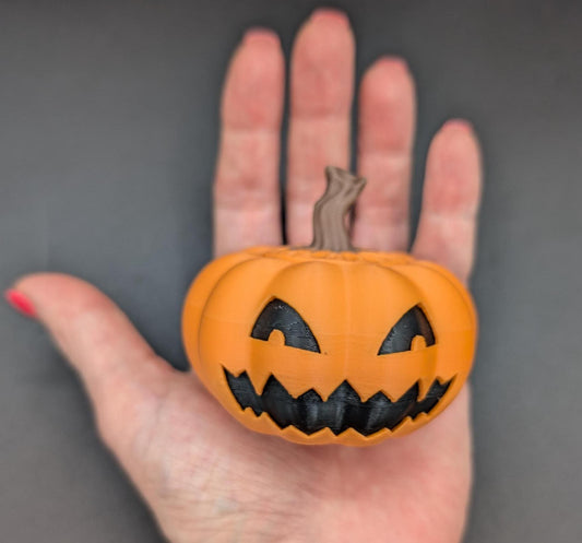 Introducing our Spooky Halloween Pumpkin Toy, a delightful blend of mischief & spooky fun. Perfect for Halloween enthusiasts & collectors, this pumpkin toy adds a playful touch to your seasonal decor. Top comes off to hide small items, even a spider!