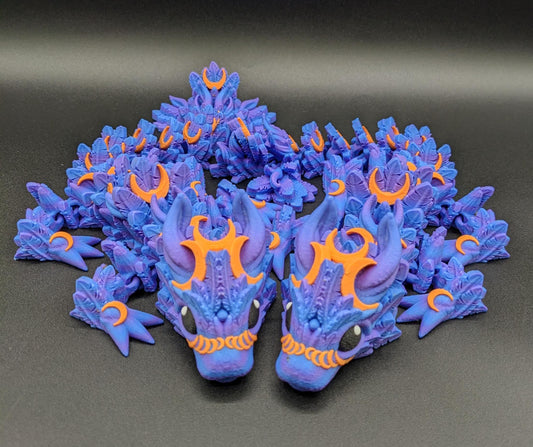 Our Halloween Lunar Dragon will add a touch of lunar magic to your Halloween decor enhancing a playful and mystical appeal. Perfect for adding a whimsical touch to any space, this dragon is sure to delight fans of all ages.