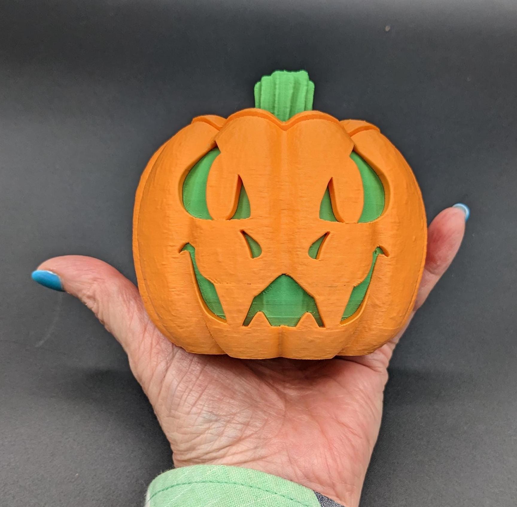 Illuminate your Halloween with our Halloween Dragon-O-Lantern, a unique and magical blend of dragon and jack-o'-lantern. This enchanting piece is perfect for adding a mystical touch to your spooky season decor.