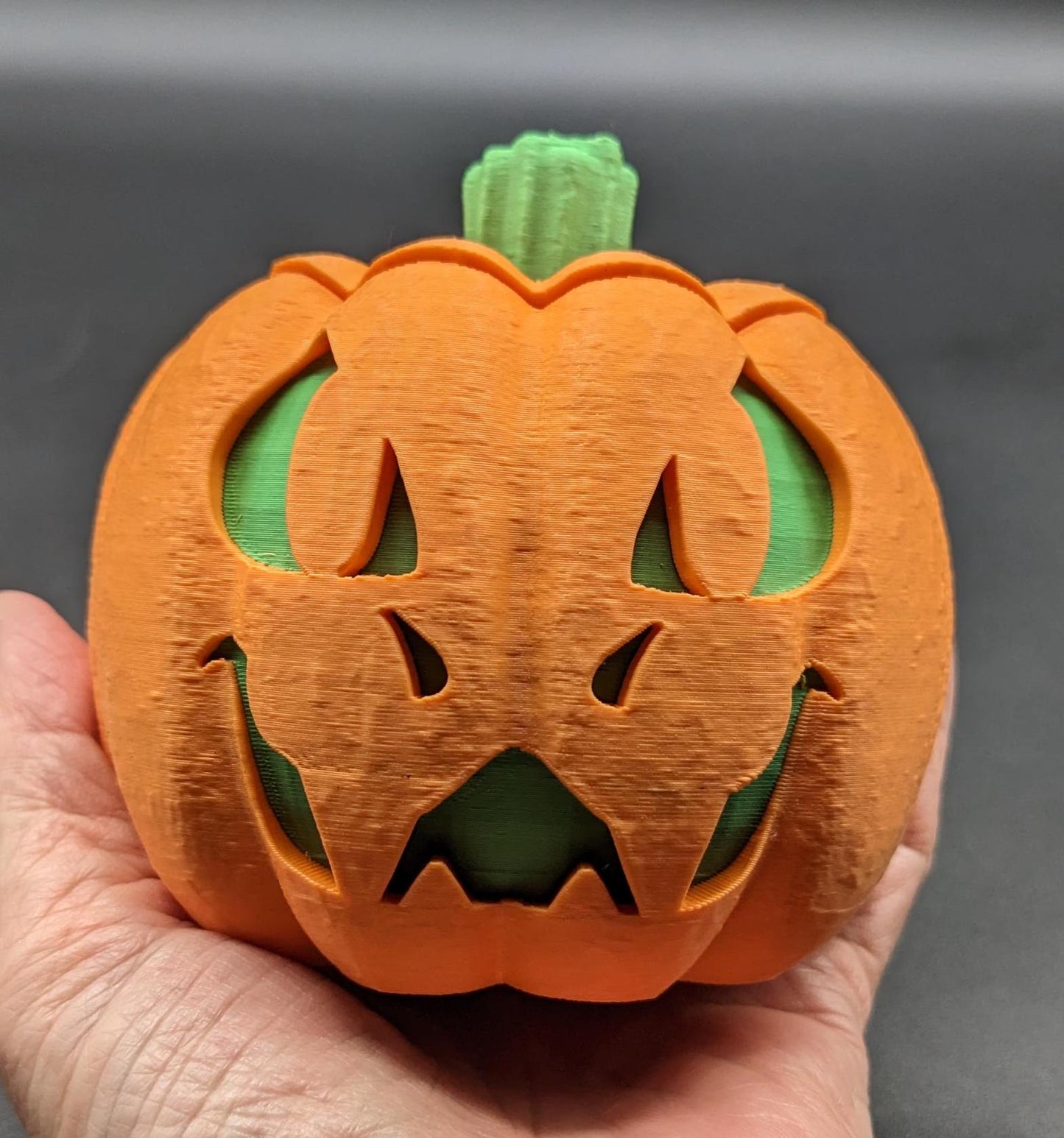 Illuminate your Halloween with our Halloween Dragon-O-Lantern, a unique and magical blend of dragon and jack-o'-lantern. This enchanting piece is perfect for adding a mystical touch to your spooky season decor.