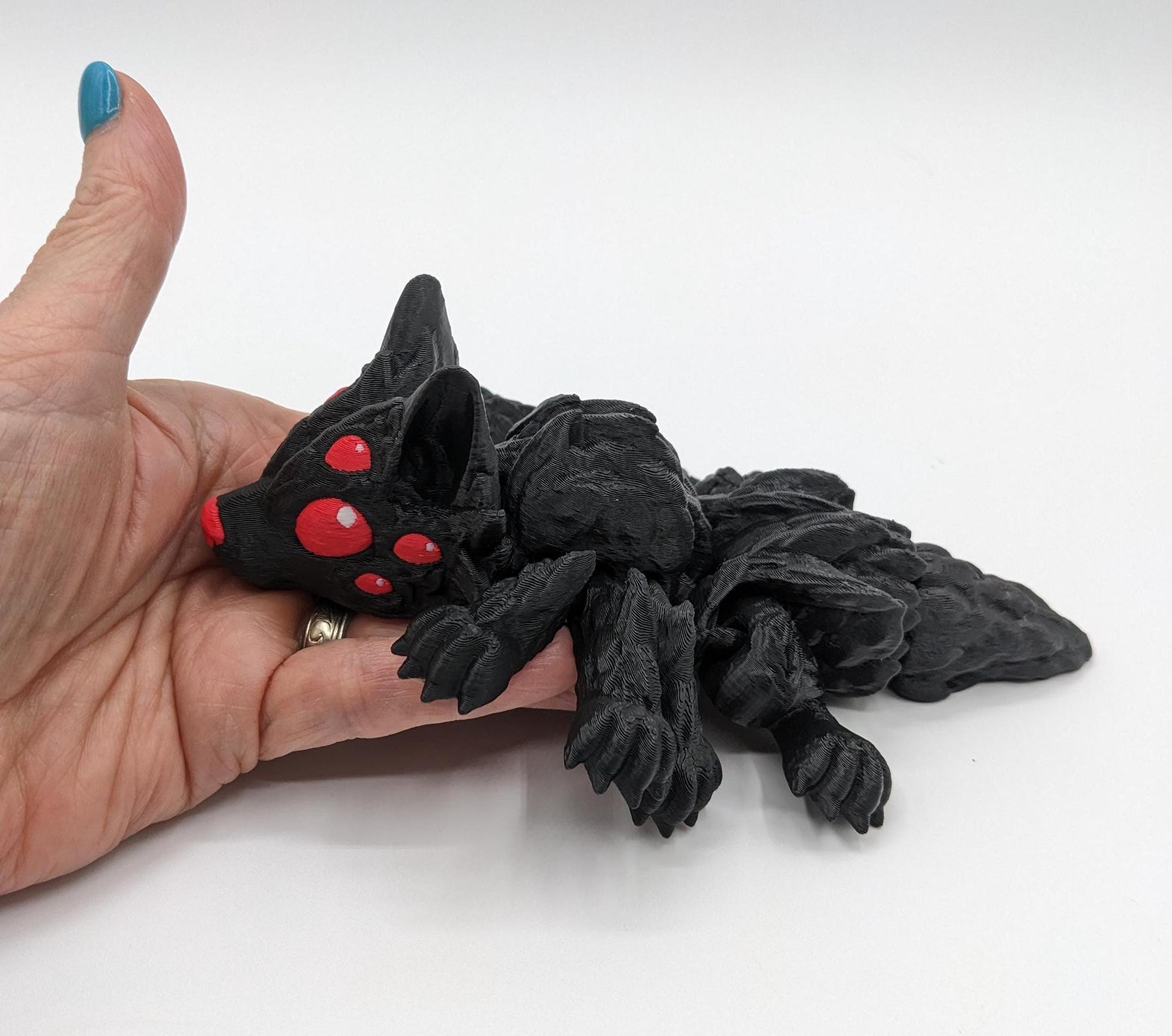 Our Large Articulated Wolf Spider features lifelike articulation, allowing you to pose it in various ways. Perfect for adding a creepy yet cool vibe to any room, this spider is a must-have for enthusiasts of all ages.