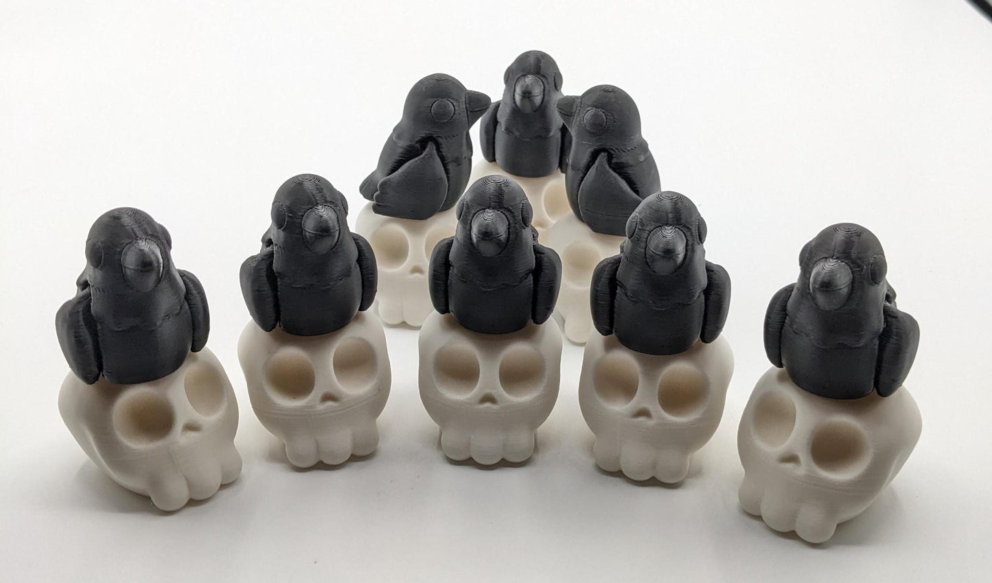 Our Poe Crow on a Skull features a meticulously crafted articulated crow perched on a skull, embodying the perfect blend of mystery and sophistication. Ideal for Halloween or year-round Gothic decor, it's sure to become a conversation starter.