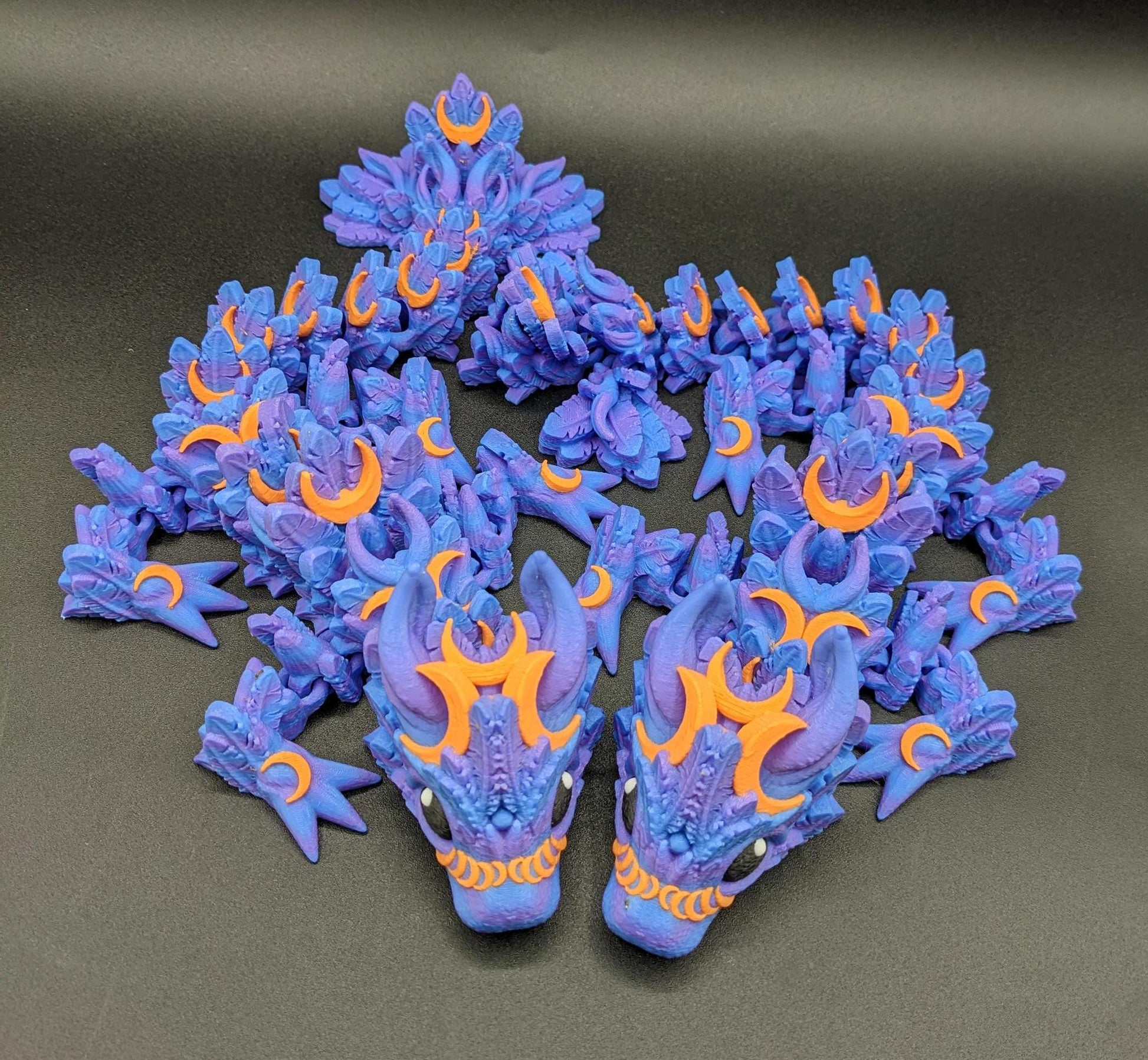 Our Halloween Lunar Dragon will add a touch of lunar magic to your Halloween decor enhancing a playful and mystical appeal. Perfect for adding a whimsical touch to any space, this dragon is sure to delight fans of all ages.