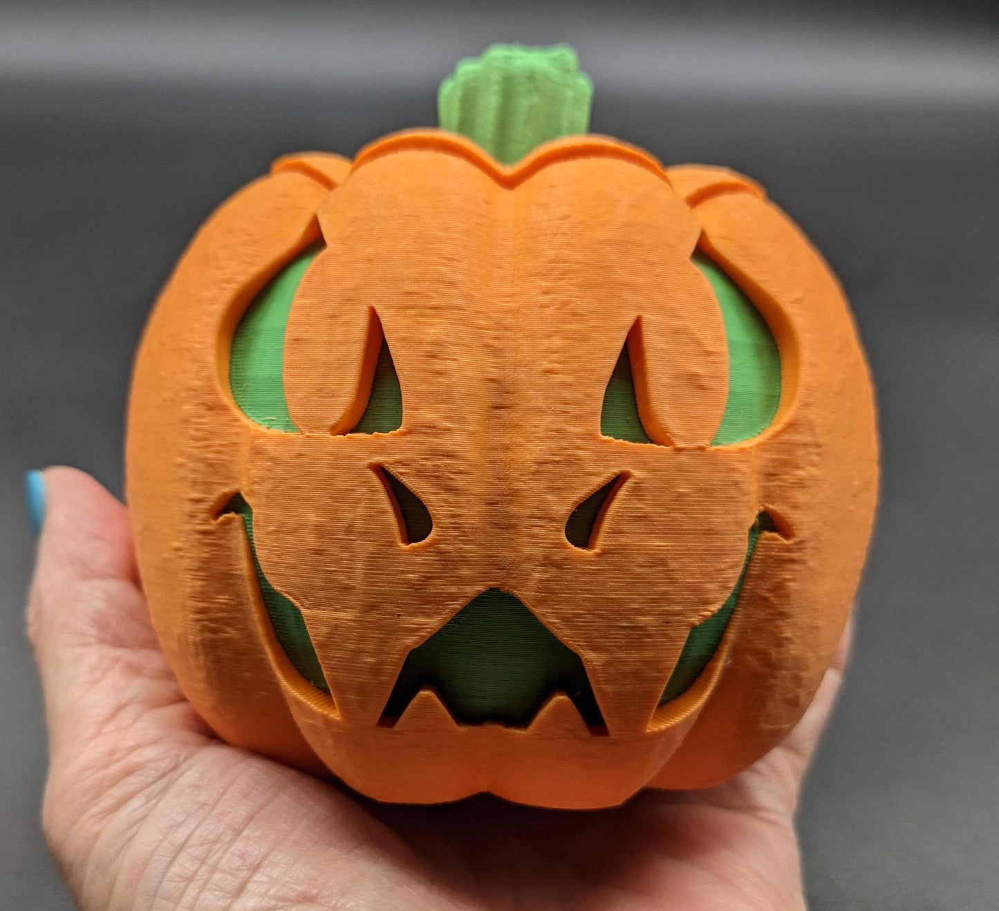 Illuminate your Halloween with our Halloween Dragon-O-Lantern, a unique and magical blend of dragon and jack-o'-lantern. This enchanting piece is perfect for adding a mystical touch to your spooky season decor.