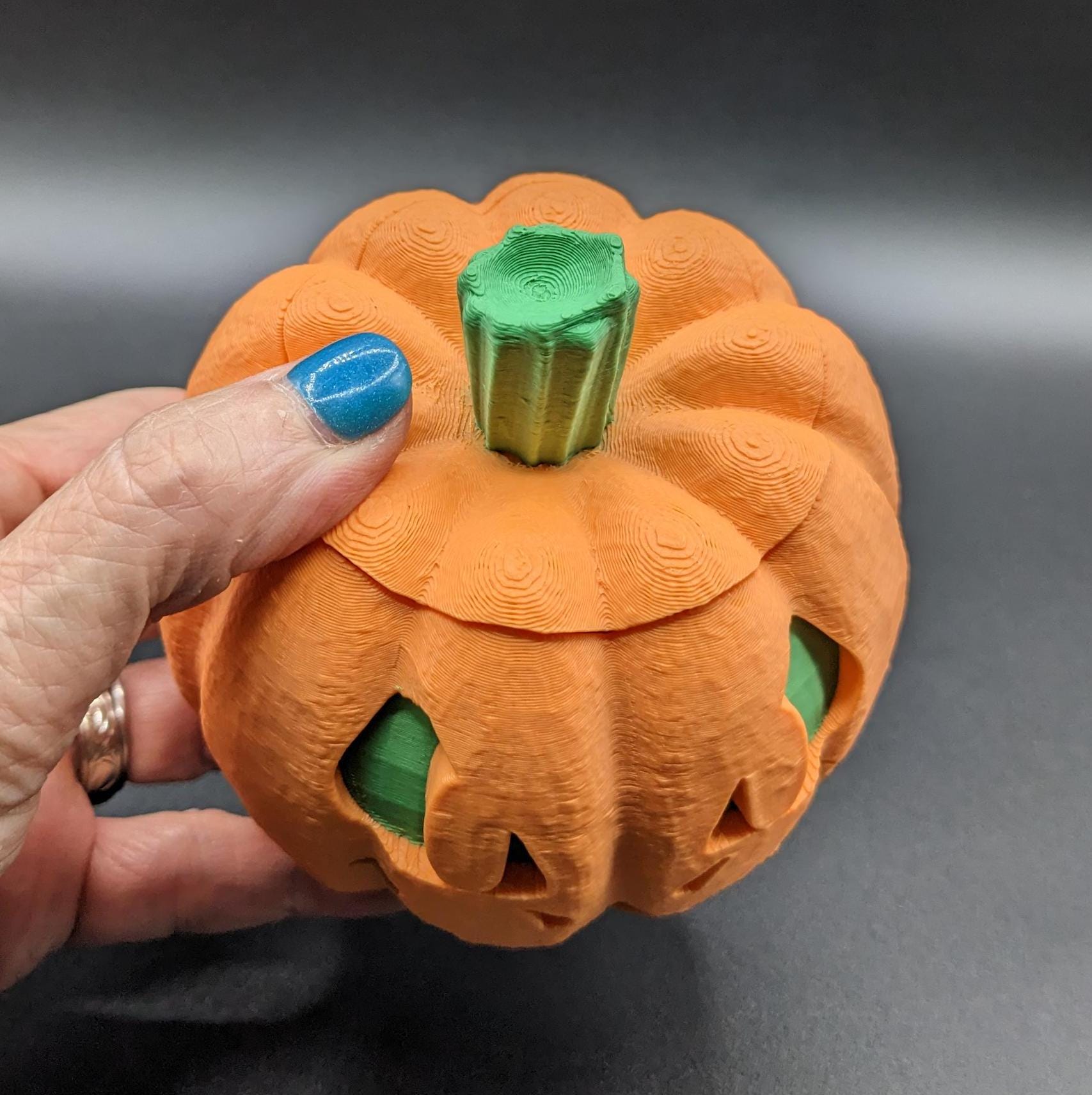 Illuminate your Halloween with our Halloween Dragon-O-Lantern, a unique and magical blend of dragon and jack-o'-lantern. This enchanting piece is perfect for adding a mystical touch to your spooky season decor.