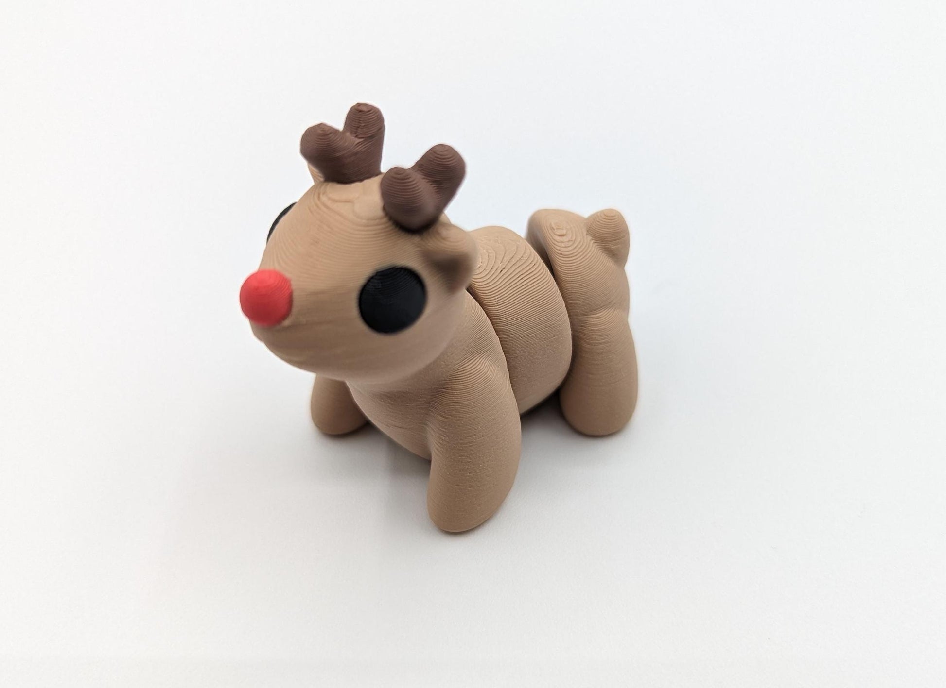 Bring holiday cheer with our Adorable Baby Reindeer Fidget Toy. This cute and festive reindeer is perfect for adding a playful touch to your holiday celebrations.