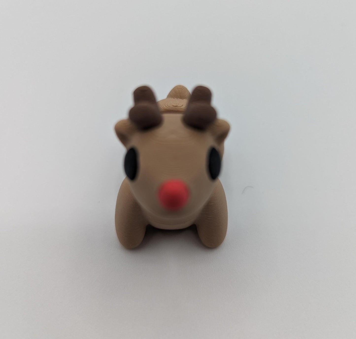 Bring holiday cheer with our Adorable Baby Reindeer Fidget Toy. This cute and festive reindeer is perfect for adding a playful touch to your holiday celebrations.