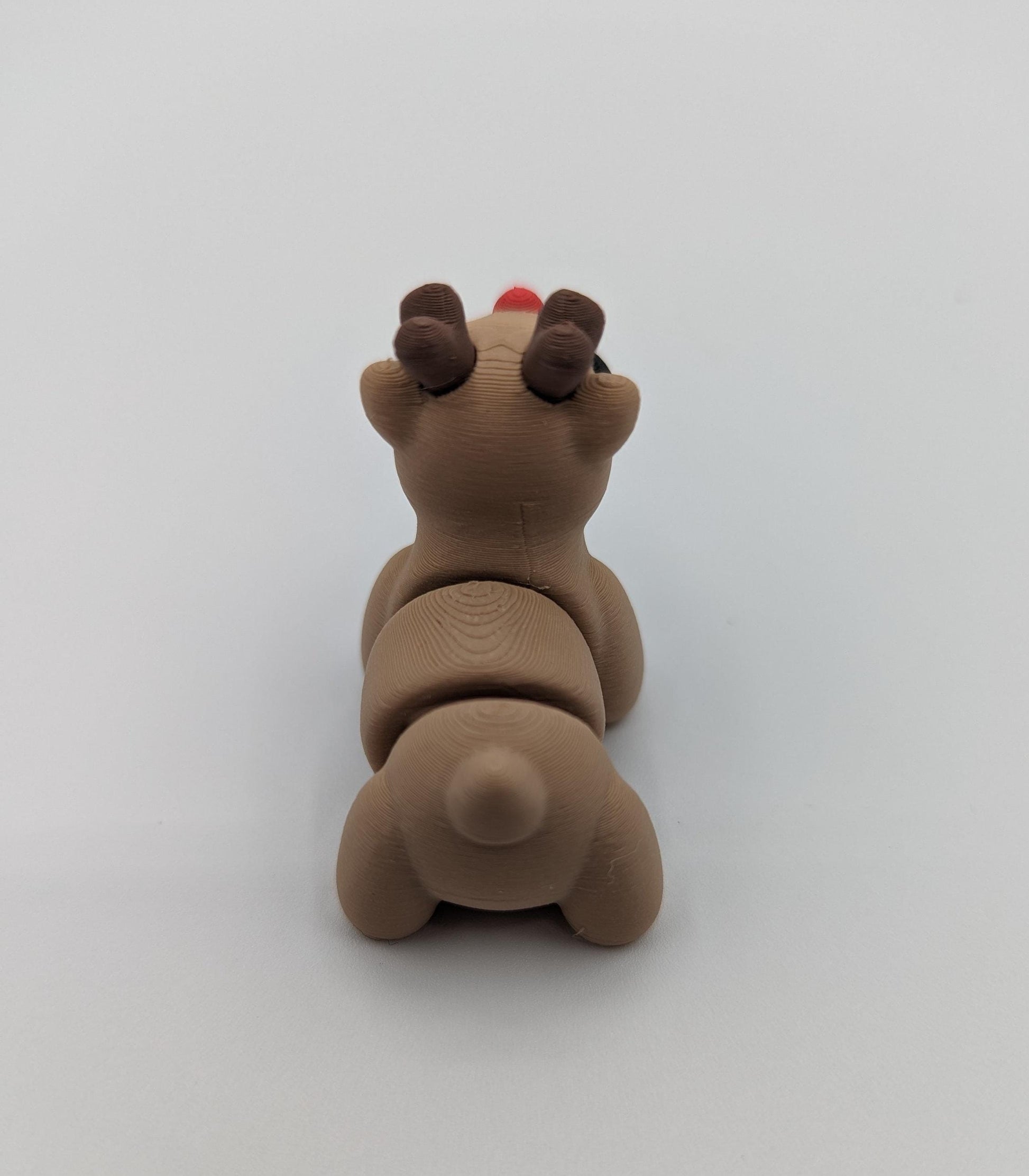 Bring holiday cheer with our Adorable Baby Reindeer Fidget Toy. This cute and festive reindeer is perfect for adding a playful touch to your holiday celebrations.