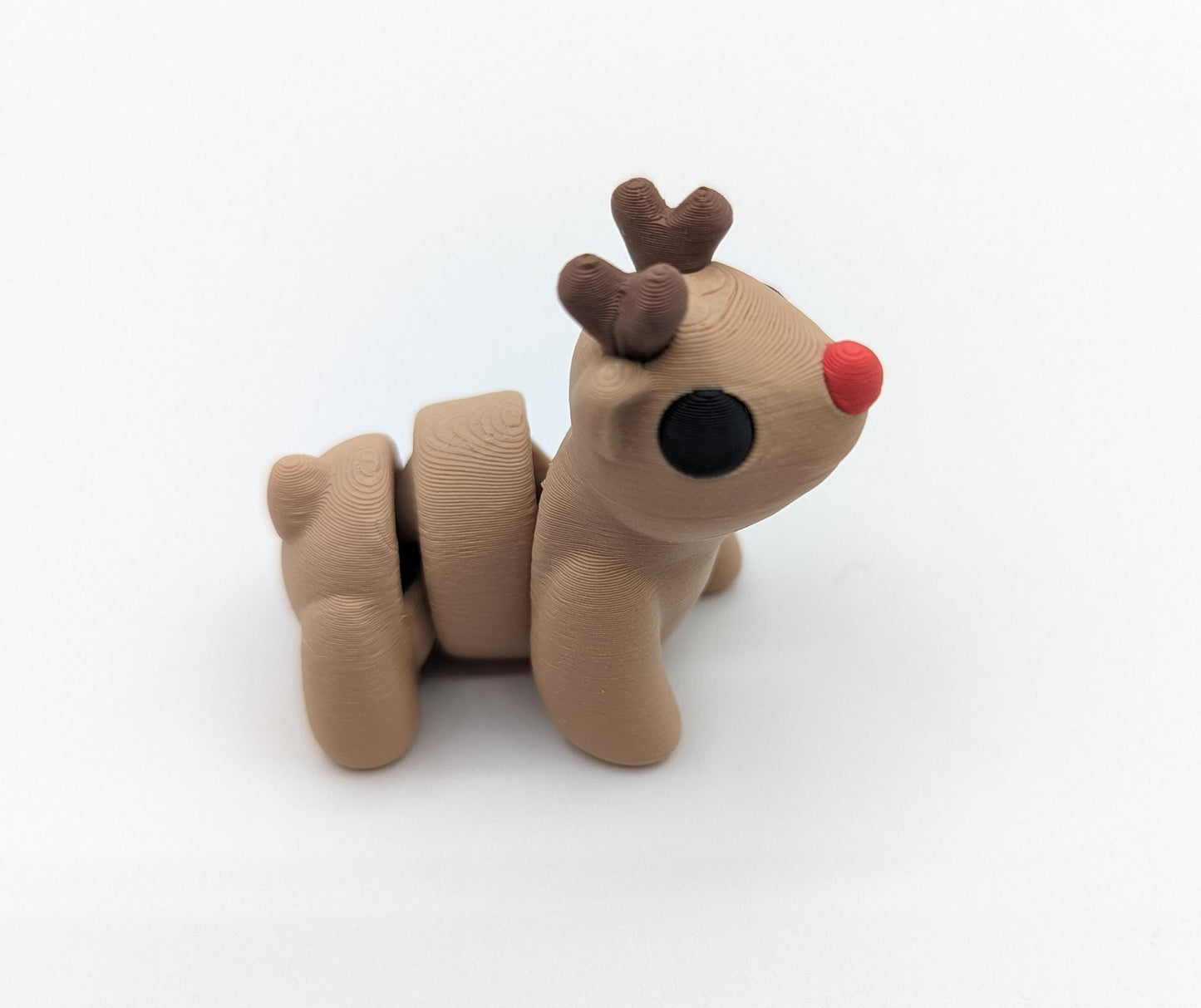Bring holiday cheer with our Adorable Baby Reindeer Fidget Toy. This cute and festive reindeer is perfect for adding a playful touch to your holiday celebrations.