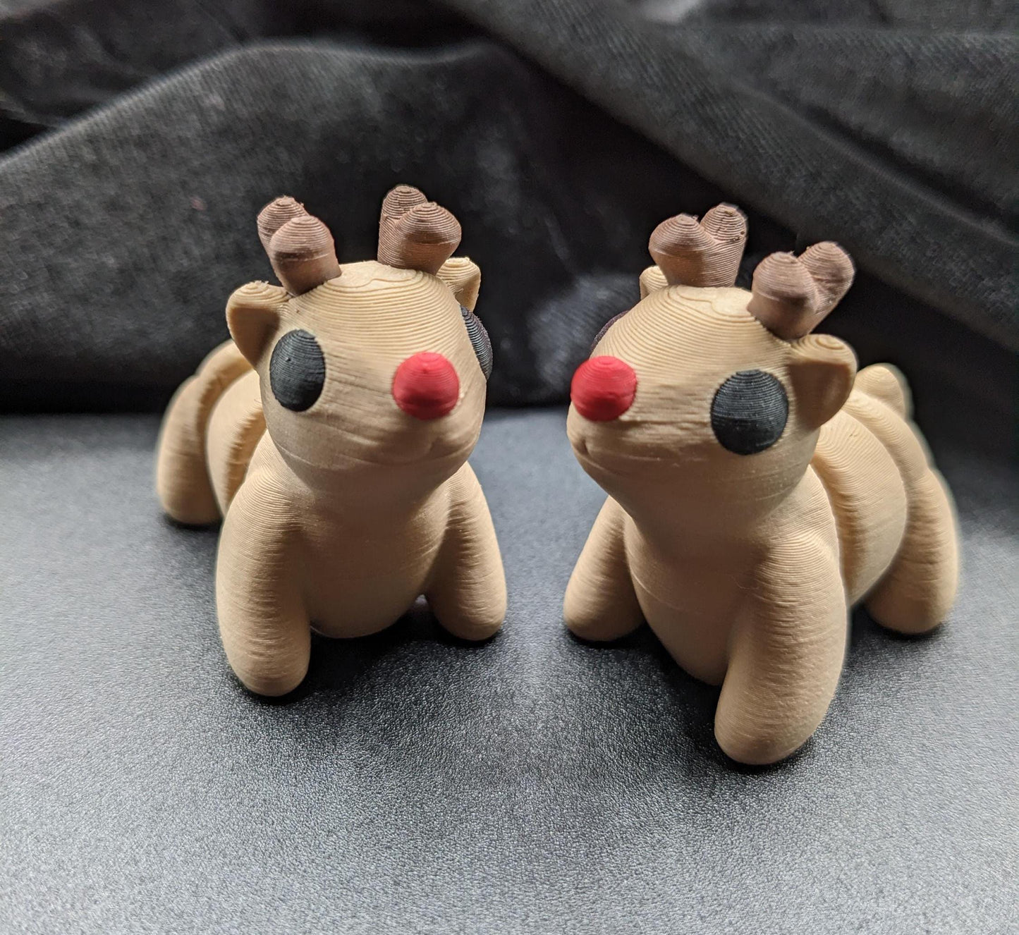 Bring holiday cheer with our Adorable Baby Reindeer Fidget Toy. This cute and festive reindeer is perfect for adding a playful touch to your holiday celebrations.