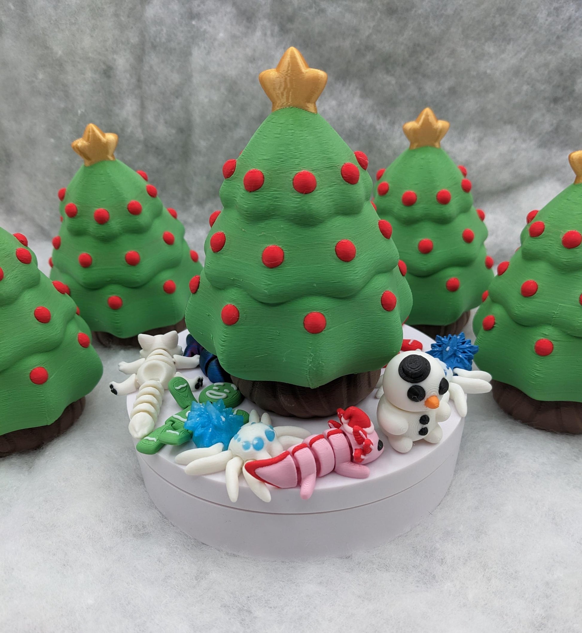 Unveil the magic of the holidays with our Christmas Tree with Secret Compartment featuring 10 adorable mini animals. This enchanting tree is perfect for adding a playful and mysterious touch to your festive decor.
