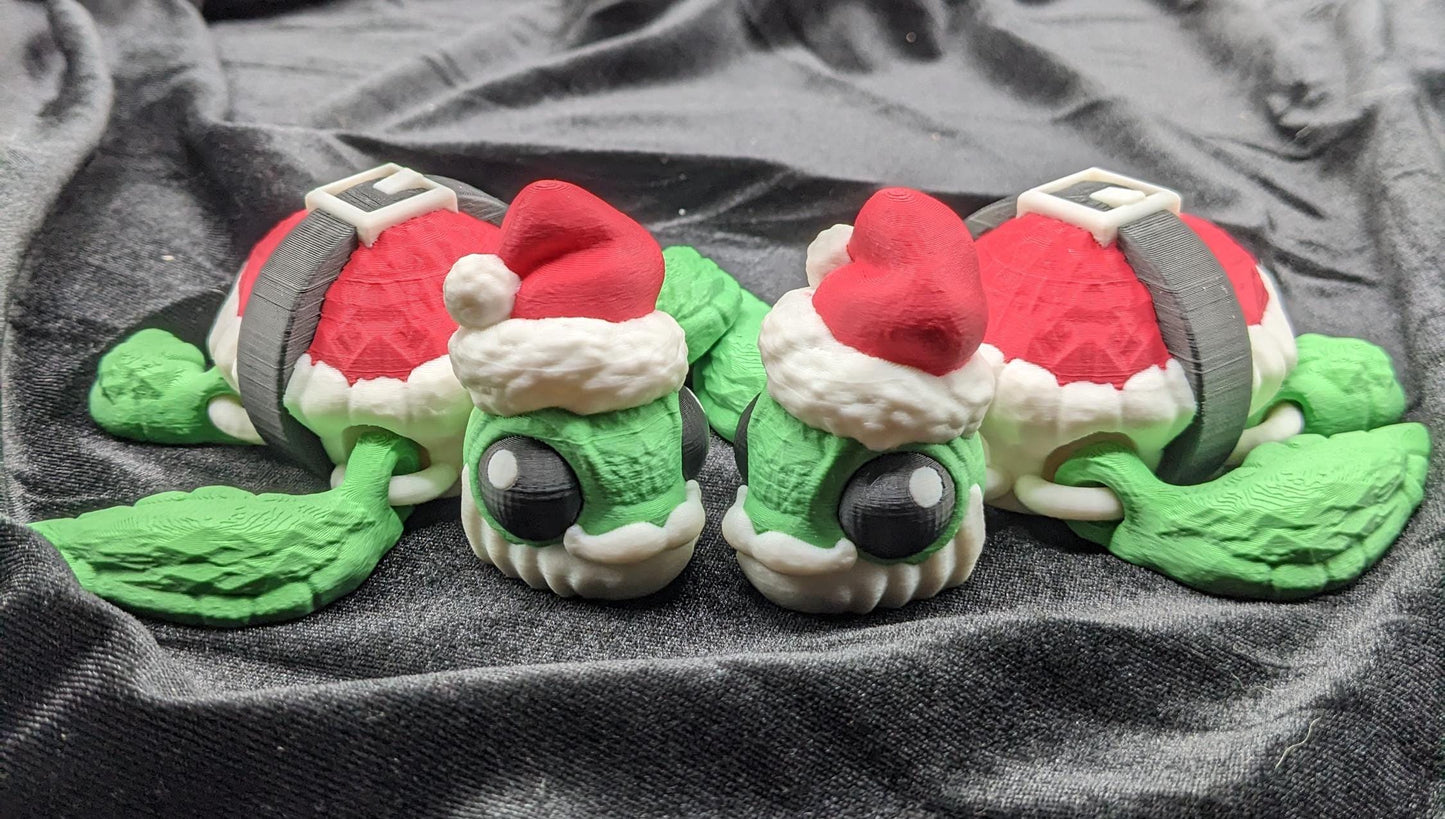 Bring holiday cheer with our Jolly Articulated Santa Sea Turtle! Our festive turtle is dressed for the season in a Santa-inspired suit ensured to bring joy and smiles for the holiday season!