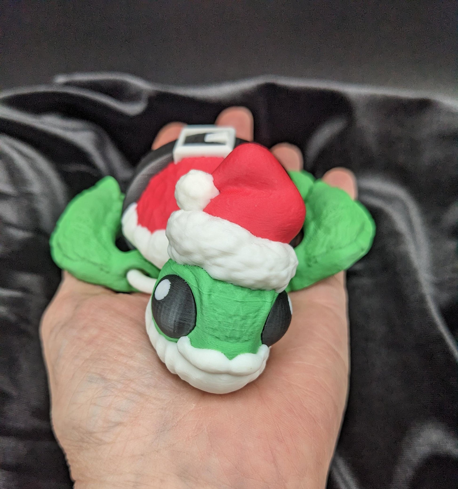 Bring holiday cheer with our Jolly Articulated Santa Sea Turtle! Our festive turtle is dressed for the season in a Santa-inspired suit ensured to bring joy and smiles for the holiday season!