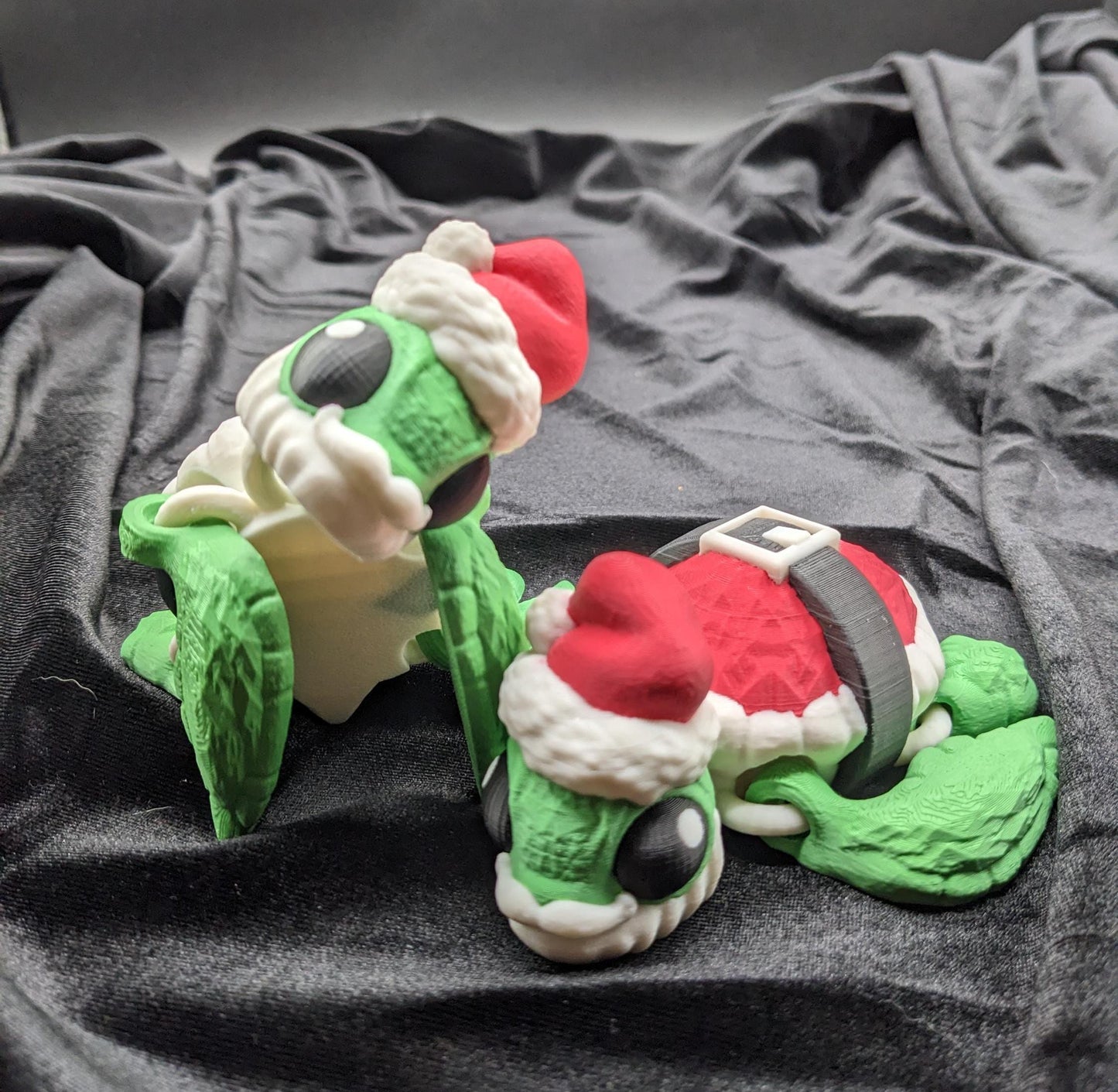 Bring holiday cheer with our Jolly Articulated Santa Sea Turtle! Our festive turtle is dressed for the season in a Santa-inspired suit ensured to bring joy and smiles for the holiday season!