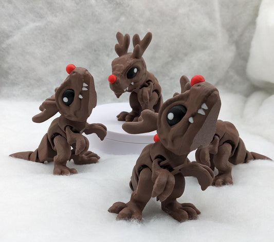 Our Christmas T-Rex combines the charm of Christmas with the fun of dinosaurs. An interactive toy for kids & adults alike,  articulated joints for posing & fidgeting, T-Rex is perfect as a stocking stuffer, desk toy, or playful holiday decoration.