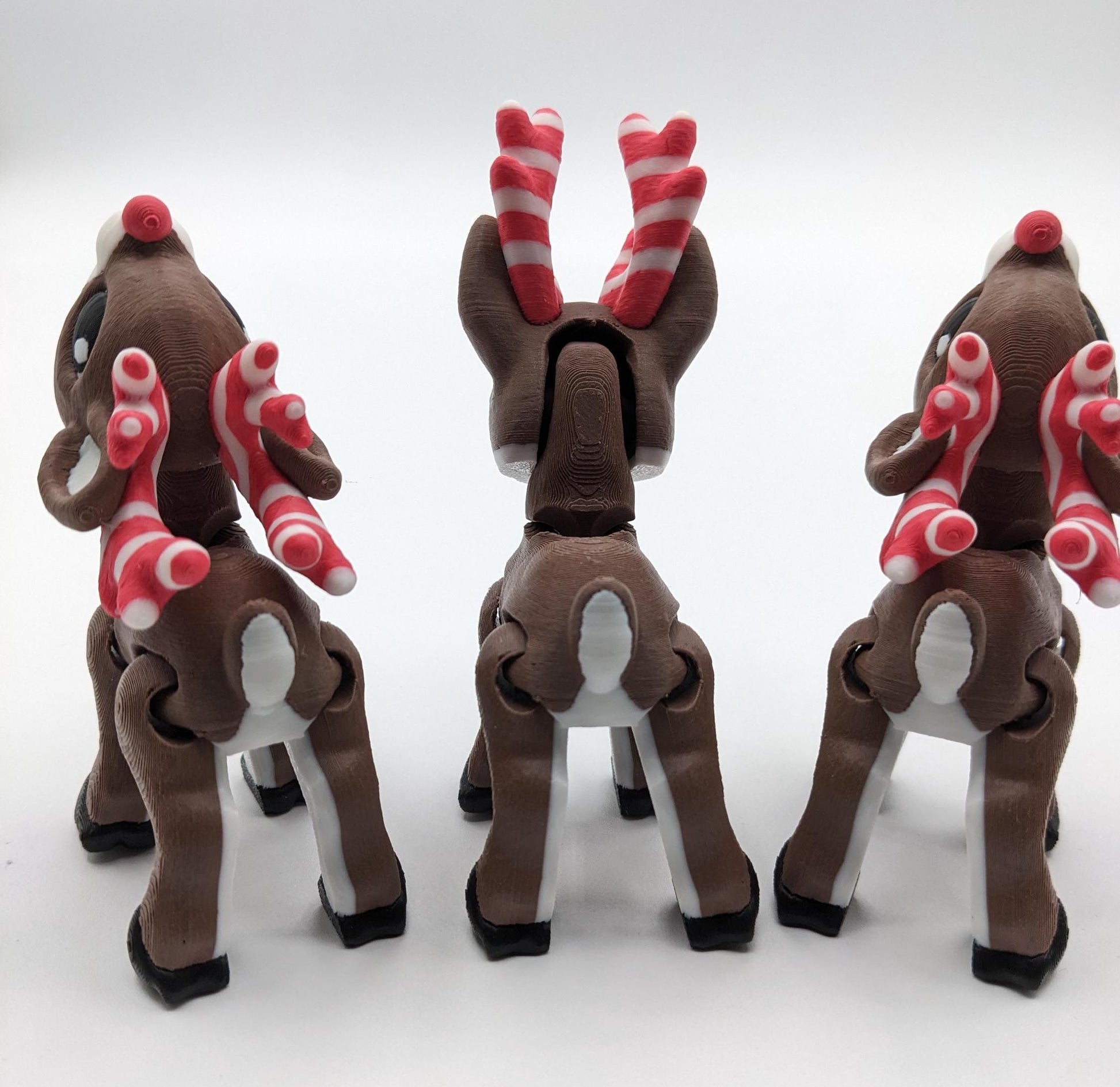 Our baby reindeer, inspired by holiday candy canes, is the perfect blend of fun & festive  creativity. Fully articulated & poseable body, this fidget toy is ideal for stress relief, creative play, or adding a whimsical touch to your Christmas decor.