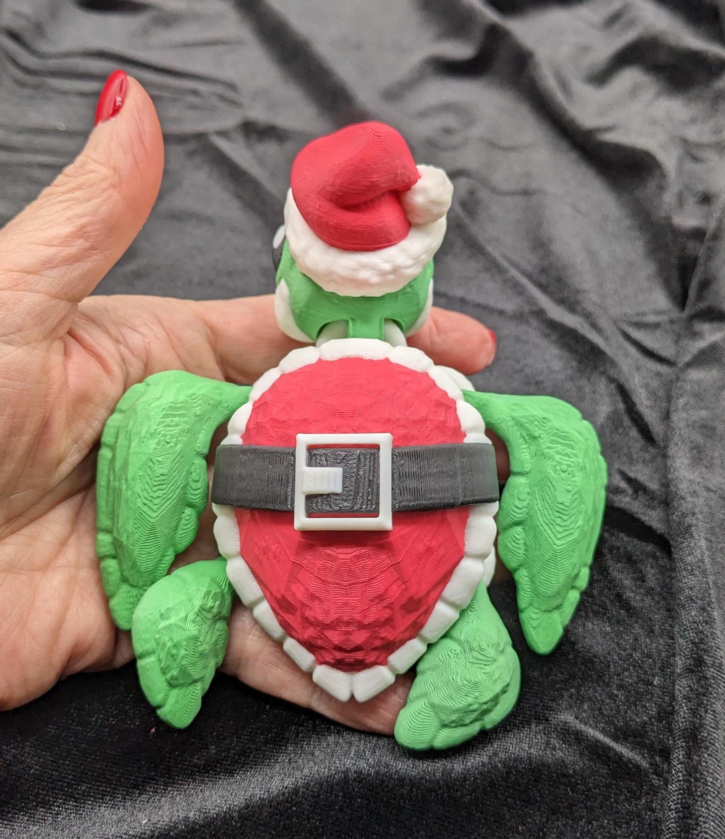 Bring holiday cheer with our Jolly Articulated Santa Sea Turtle! Our festive turtle is dressed for the season in a Santa-inspired suit ensured to bring joy and smiles for the holiday season!