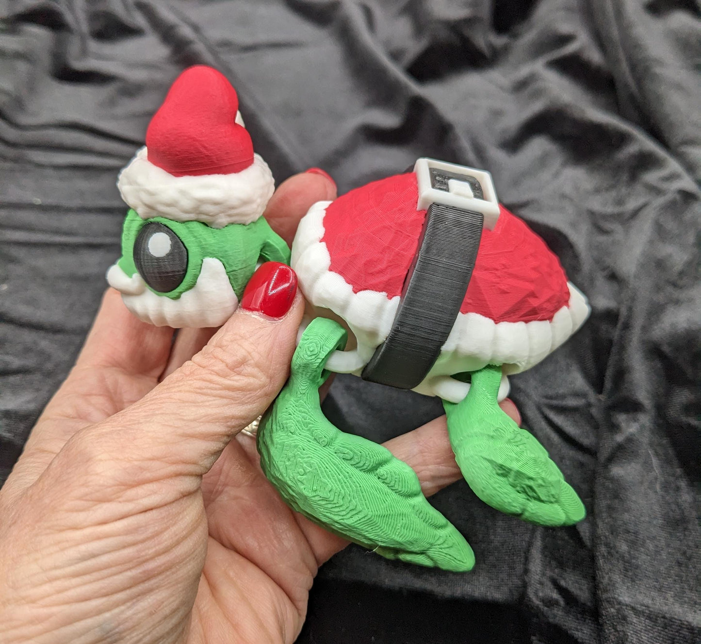 Bring holiday cheer with our Jolly Articulated Santa Sea Turtle! Our festive turtle is dressed for the season in a Santa-inspired suit ensured to bring joy and smiles for the holiday season!