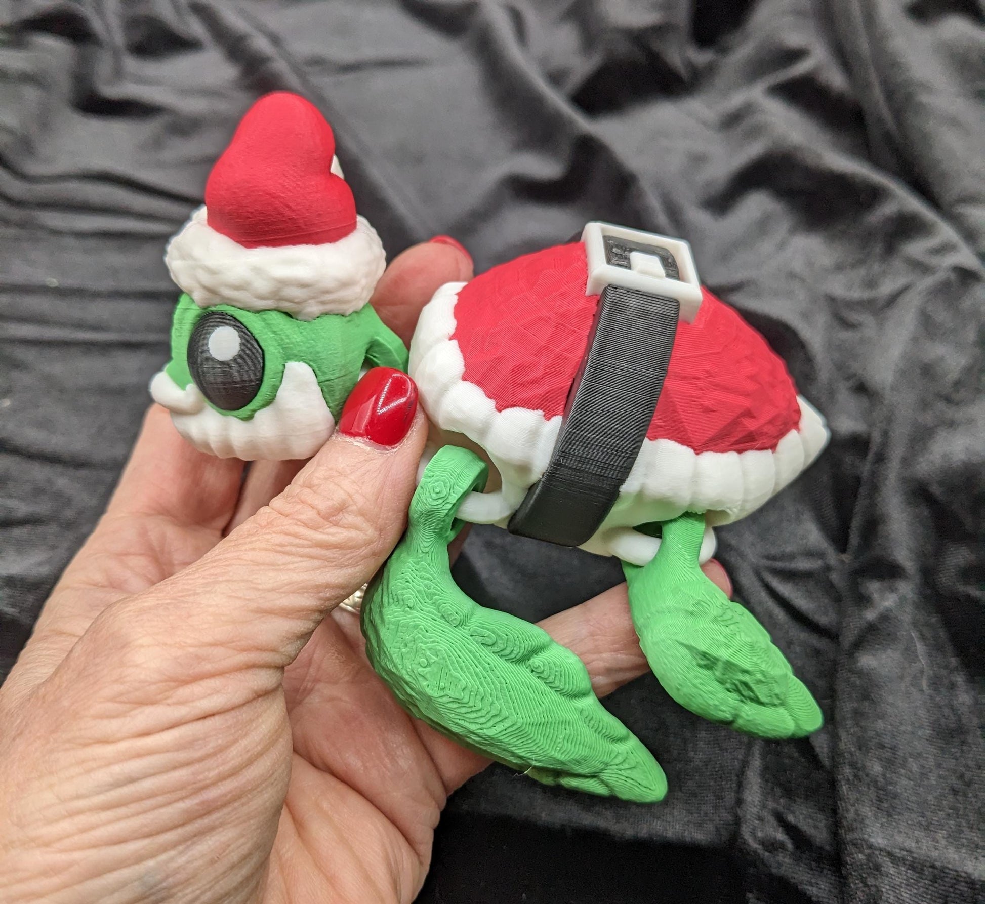 Bring holiday cheer with our Jolly Articulated Santa Sea Turtle! Our festive turtle is dressed for the season in a Santa-inspired suit ensured to bring joy and smiles for the holiday season!