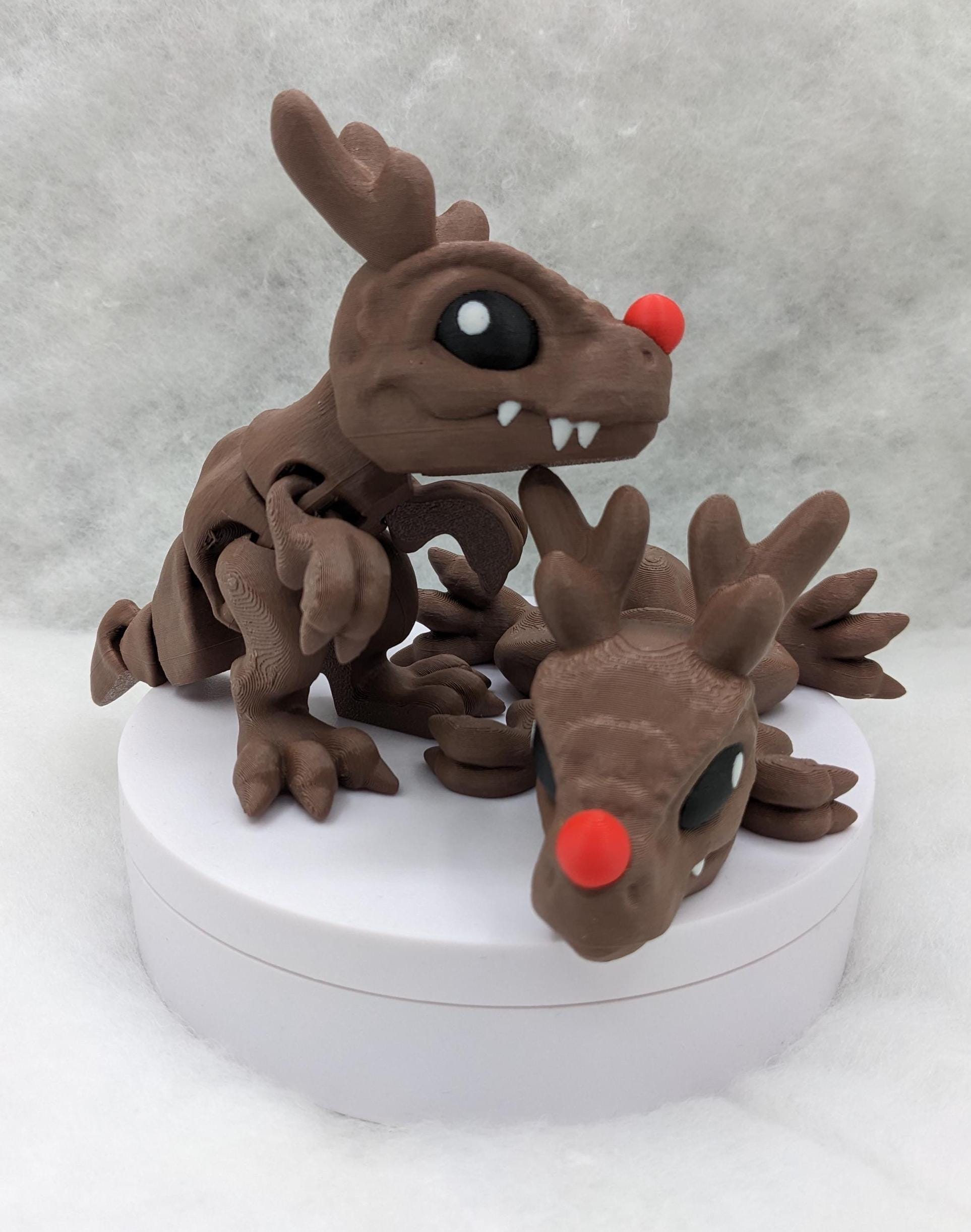 Our Christmas T-Rex combines the charm of Christmas with the fun of dinosaurs. An interactive toy for kids & adults alike,  articulated joints for posing & fidgeting, T-Rex is perfect as a stocking stuffer, desk toy, or playful holiday decoration.