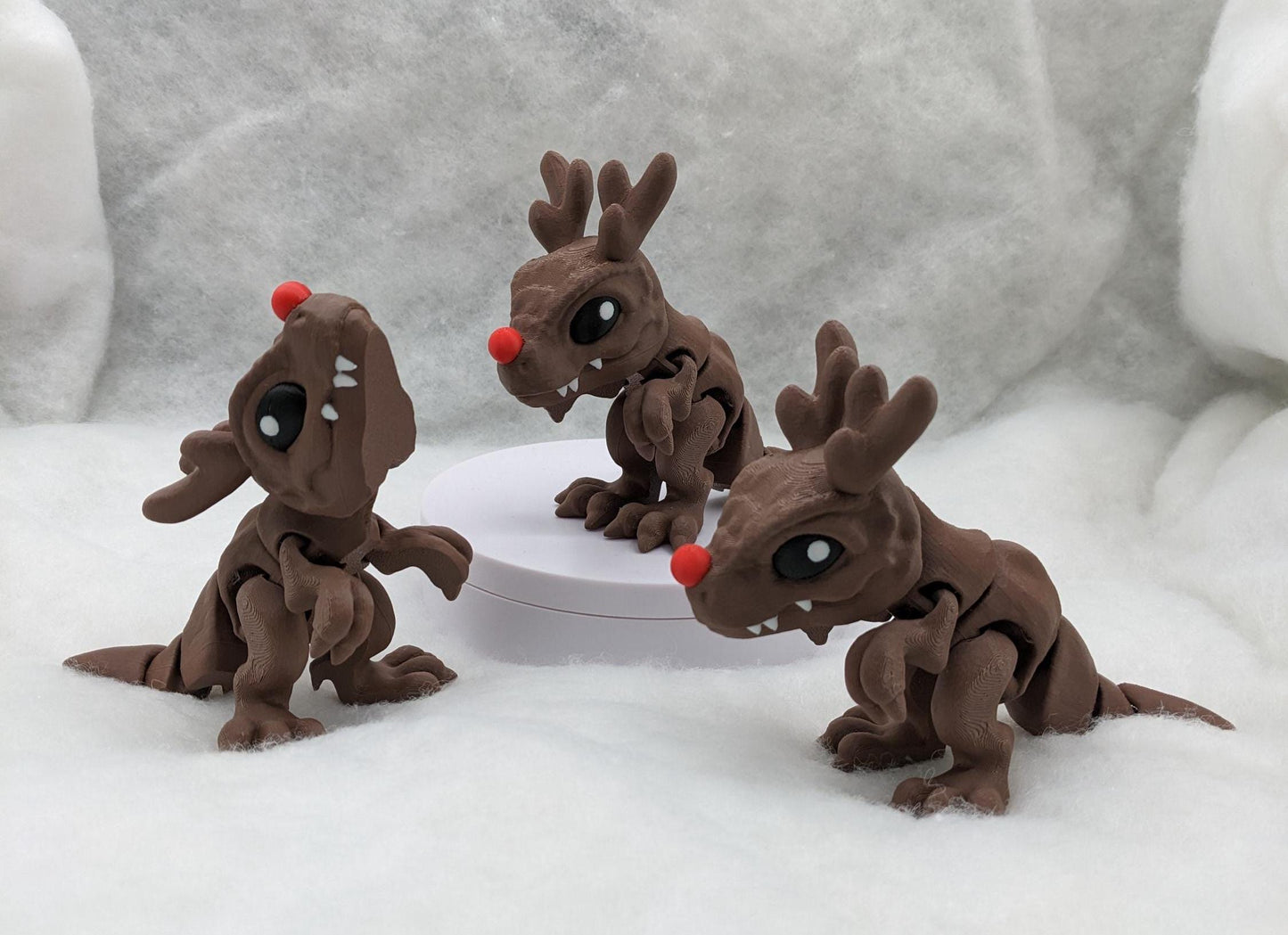 Our Christmas T-Rex combines the charm of Christmas with the fun of dinosaurs. An interactive toy for kids & adults alike,  articulated joints for posing & fidgeting, T-Rex is perfect as a stocking stuffer, desk toy, or playful holiday decoration.