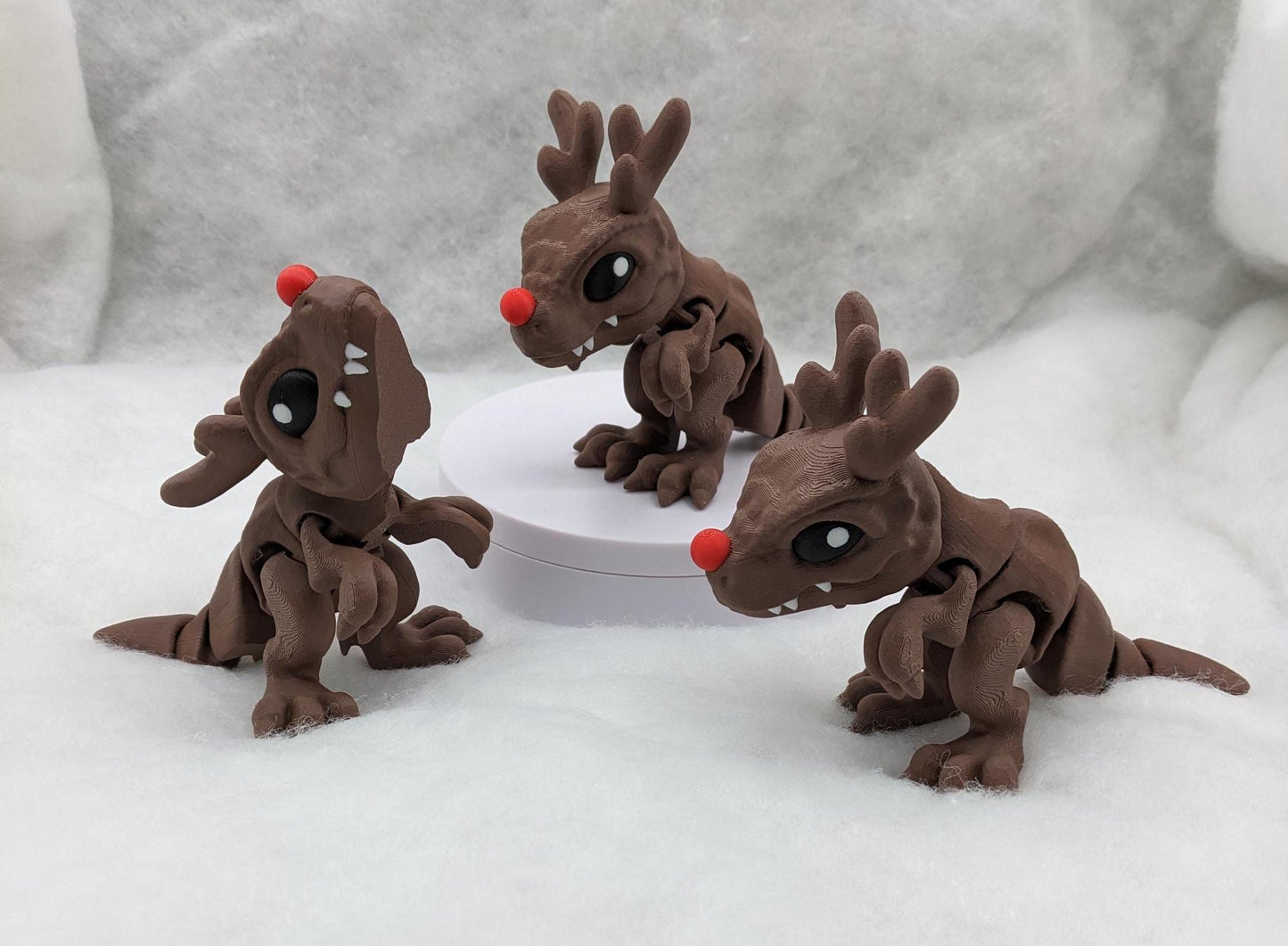 Our Christmas T-Rex combines the charm of Christmas with the fun of dinosaurs. An interactive toy for kids & adults alike,  articulated joints for posing & fidgeting, T-Rex is perfect as a stocking stuffer, desk toy, or playful holiday decoration.