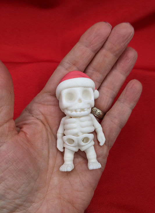 Add a playful twist to your holiday season with the Festive Flexi Christmas Santa Skeleton Fidget Toy! This unique combination of holiday cheer and spooky fun makes it the perfect toy for all ages.