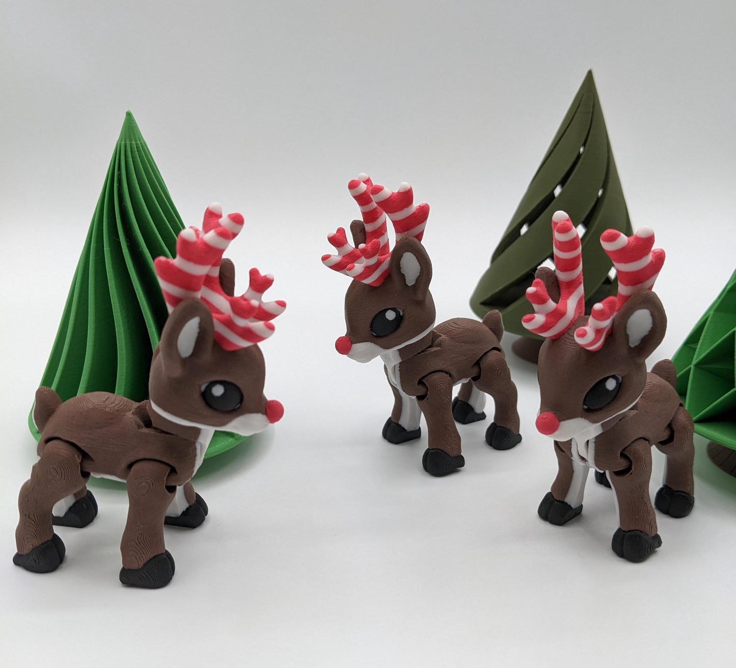 Our baby reindeer, inspired by holiday candy canes, is the perfect blend of fun & festive  creativity. Fully articulated & poseable body, this fidget toy is ideal for stress relief, creative play, or adding a whimsical touch to your Christmas decor.