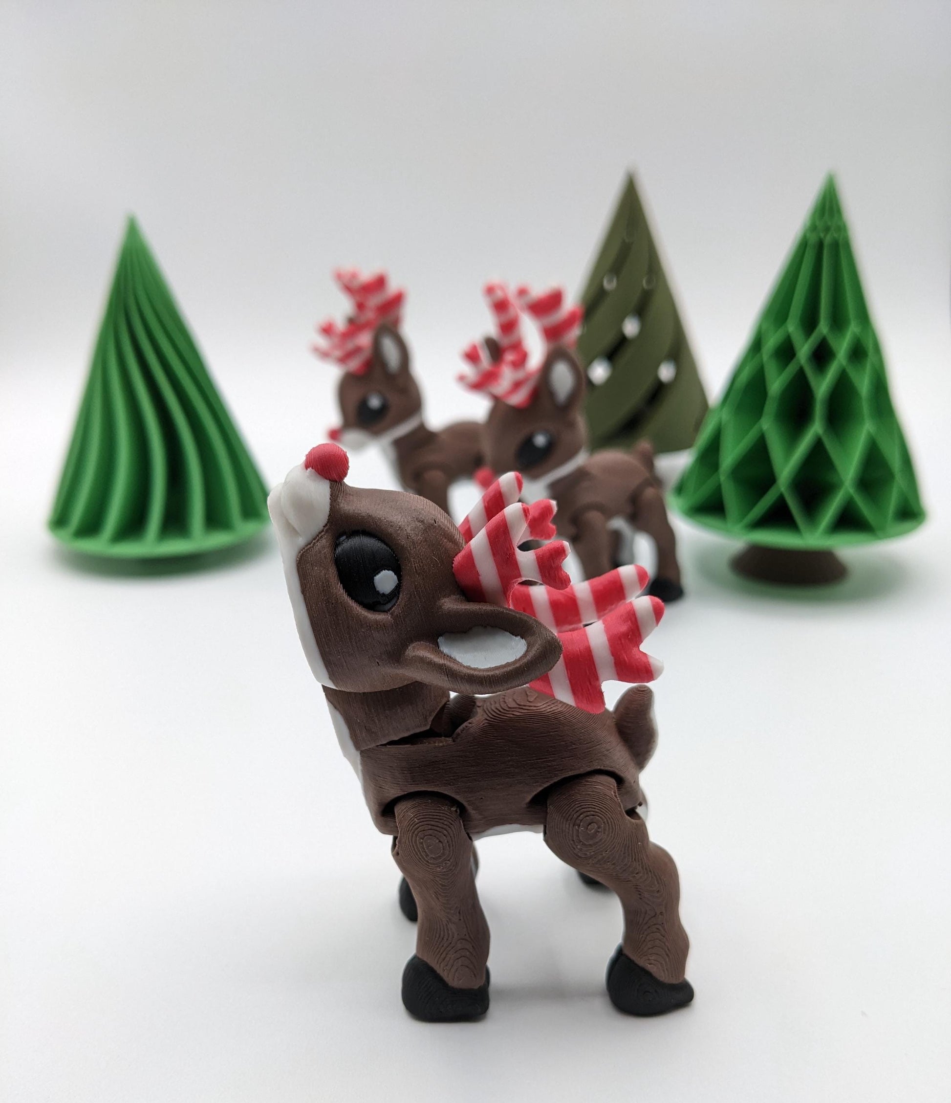 Our baby reindeer, inspired by holiday candy canes, is the perfect blend of fun & festive  creativity. Fully articulated & poseable body, this fidget toy is ideal for stress relief, creative play, or adding a whimsical touch to your Christmas decor.