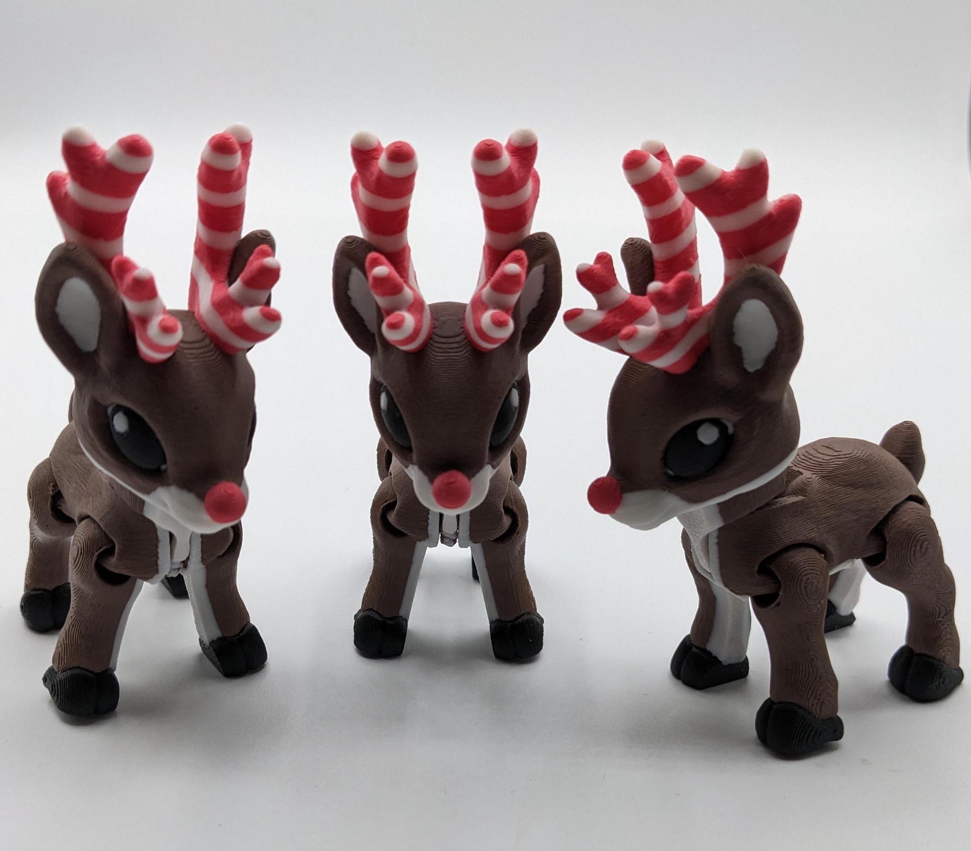 Our baby reindeer, inspired by holiday candy canes, is the perfect blend of fun & festive  creativity. Fully articulated & poseable body, this fidget toy is ideal for stress relief, creative play, or adding a whimsical touch to your Christmas decor.