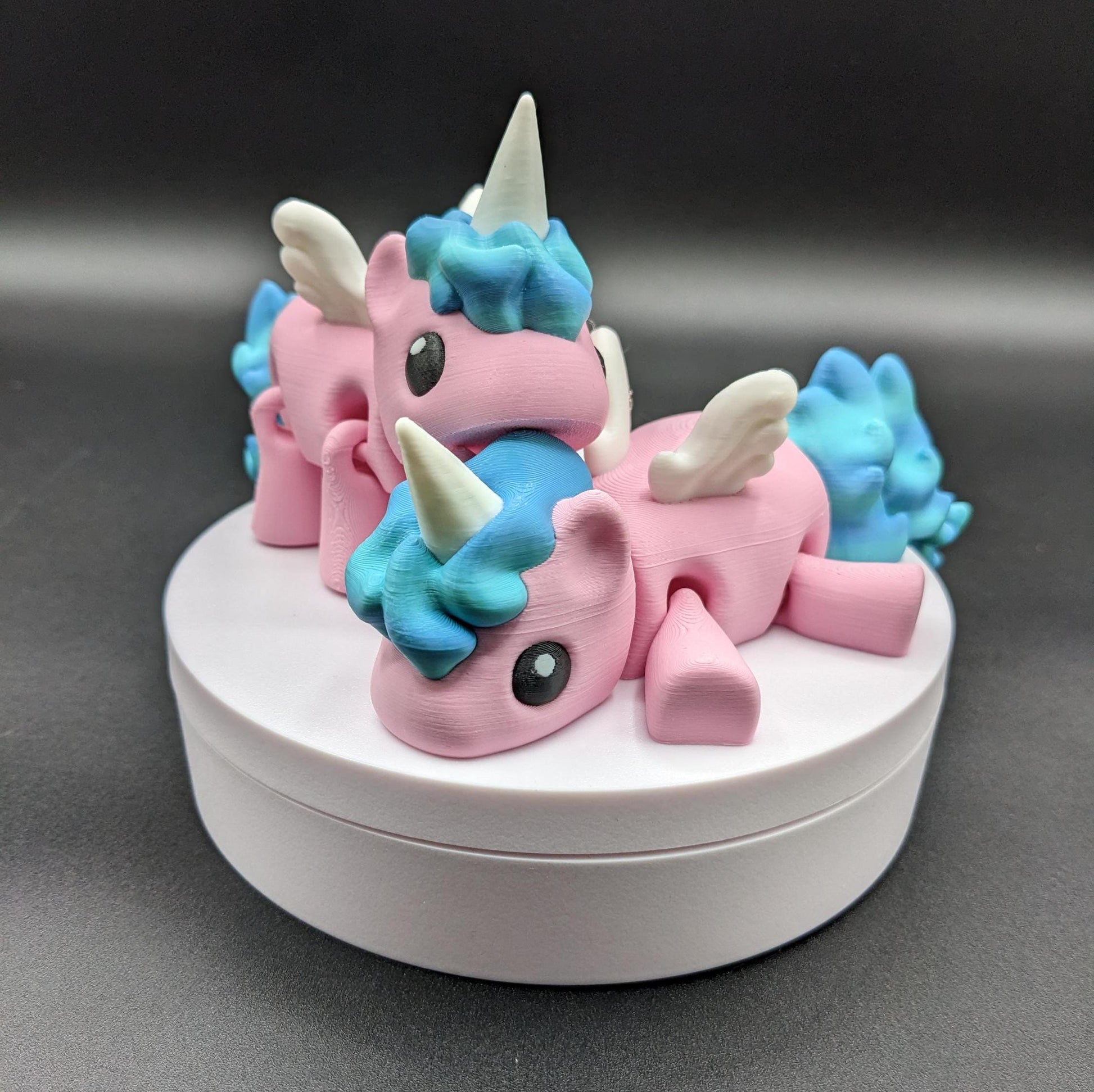 Our Magical Articulated Baby Unicorn Fidget Toy is perfect for fidgeting, imaginative play, or as a whimsical desk accessory. The perfect gift for the unicorn lover in your life or gift for yourself!